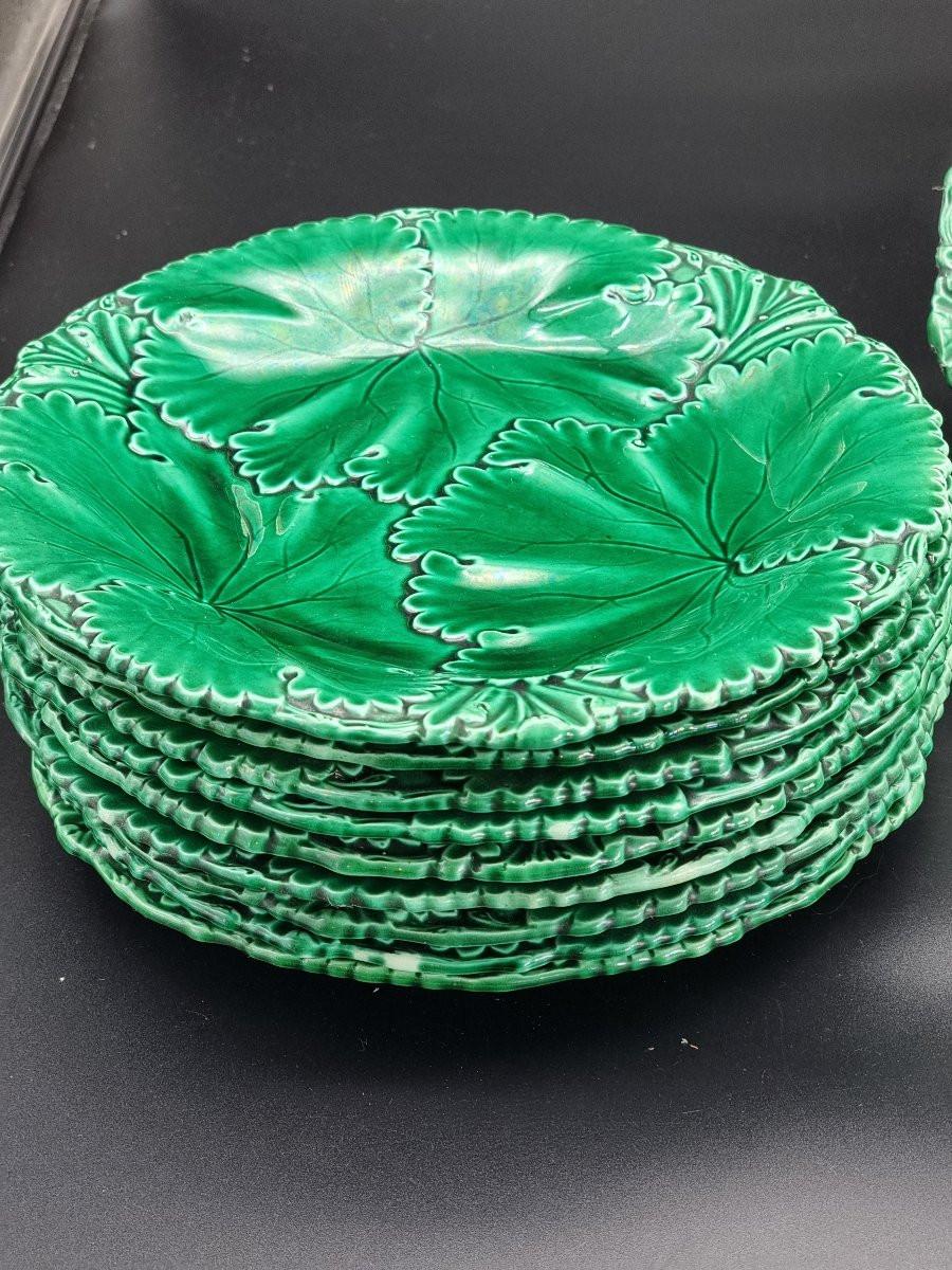 Hand-Crafted Copeland & Garrett green faience plate service, England, 19th century For Sale