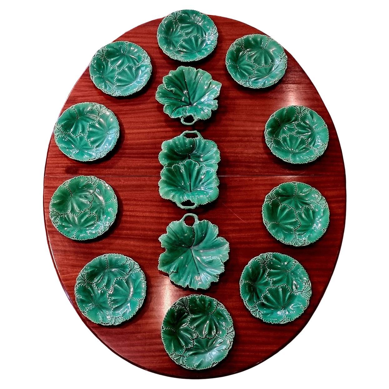 Copeland & Garrett green faience plate service, England, 19th century For Sale