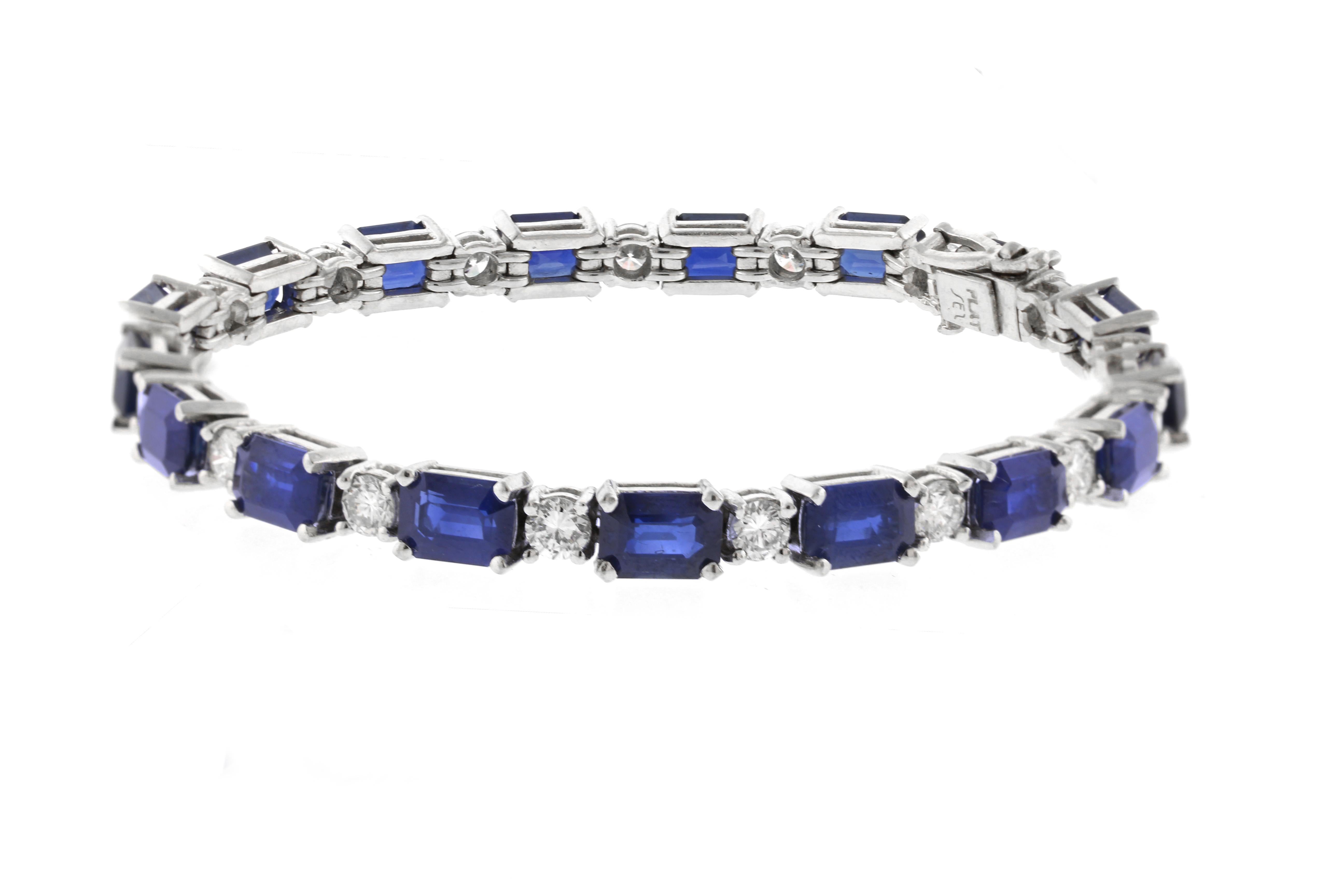 This elegant tennis bracelet from SES Creations boasts 17 emerald cut sapphires weighing approximately 18 carats and 17 round brilliant diamonds weighing approximately 2.50 carats. Crafted with precision and care, this 7-inch long bracelet is a