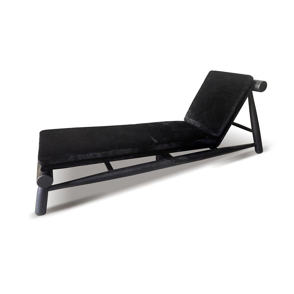 Seso daybed by Collector
Designer: Davide Monopoli
Materials: Upholstered in Siege black fabric. Solid oak wood structure.
Dimensions: W 190 x D 61 x H 70 cm x SH 43 cm

Seso series it’s all about tension. With a playful combination of