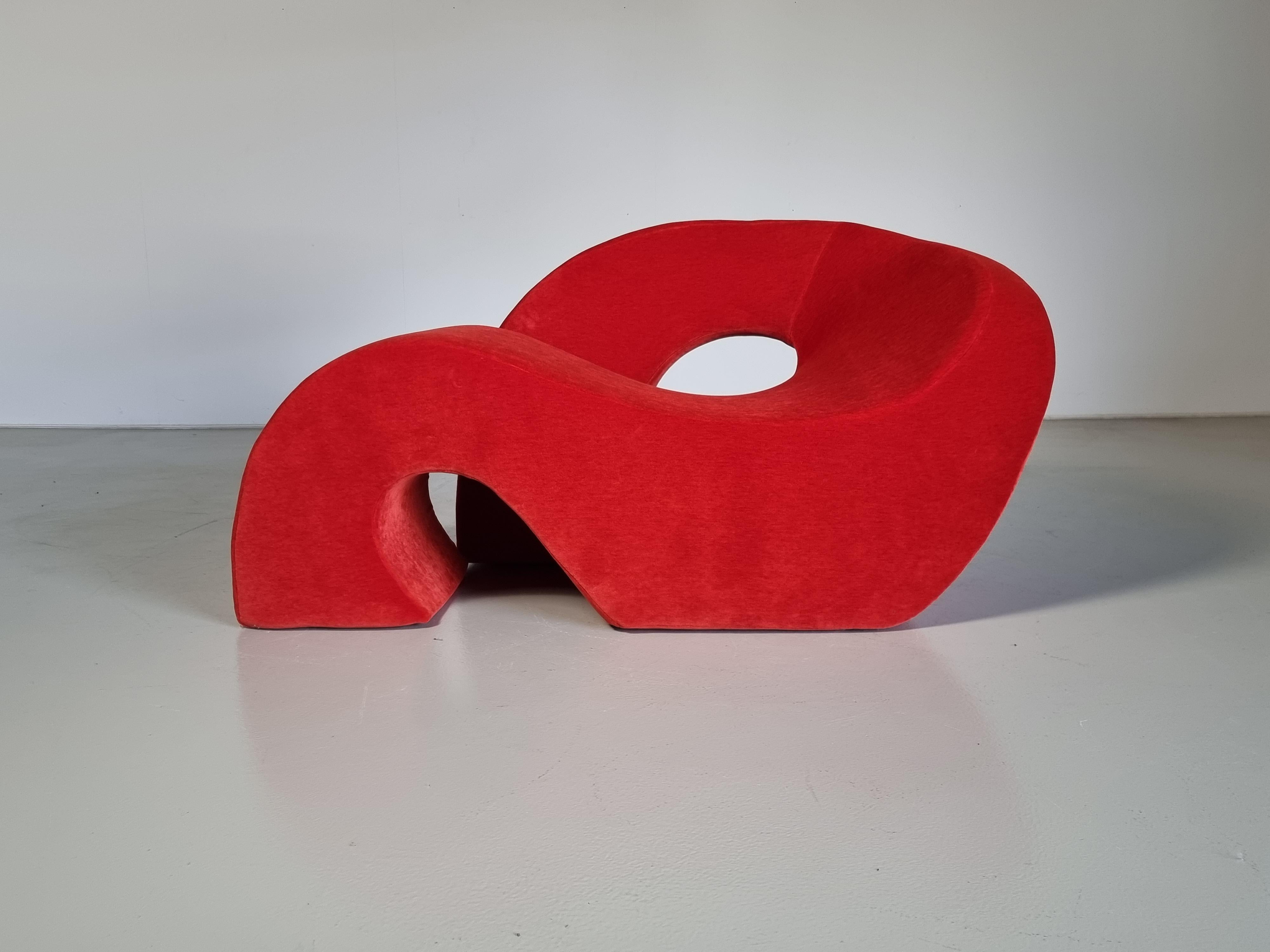 Sess lounge chair by Nani Prina for Sormani, 1968 

A very rare loop-shaped 'Sess' lounge/object chair by Nani Prina for Sormani, Italy. Designed in 1968. New cotton orange/red cotton velvet upholstery on a molded polyurethane frame.

The Sess