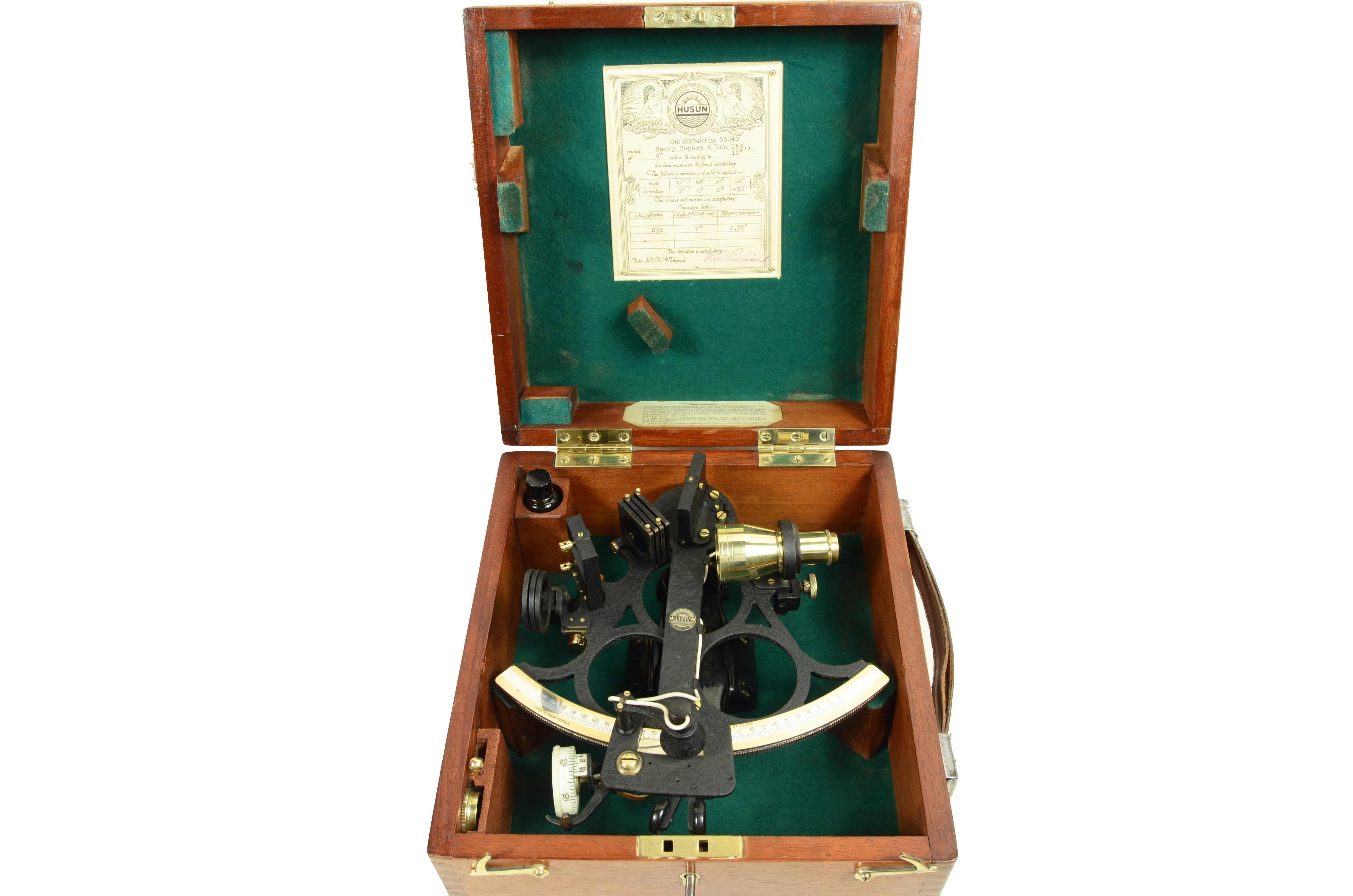 Brass sextant signed Husun Trade Mark  Serial No. 55040 and made by H. Hughes & Son Ltd London in the 1930s; instrument complete with optics and accessories and housed in an elegant original square mahogany wood box with brass hinges and locking