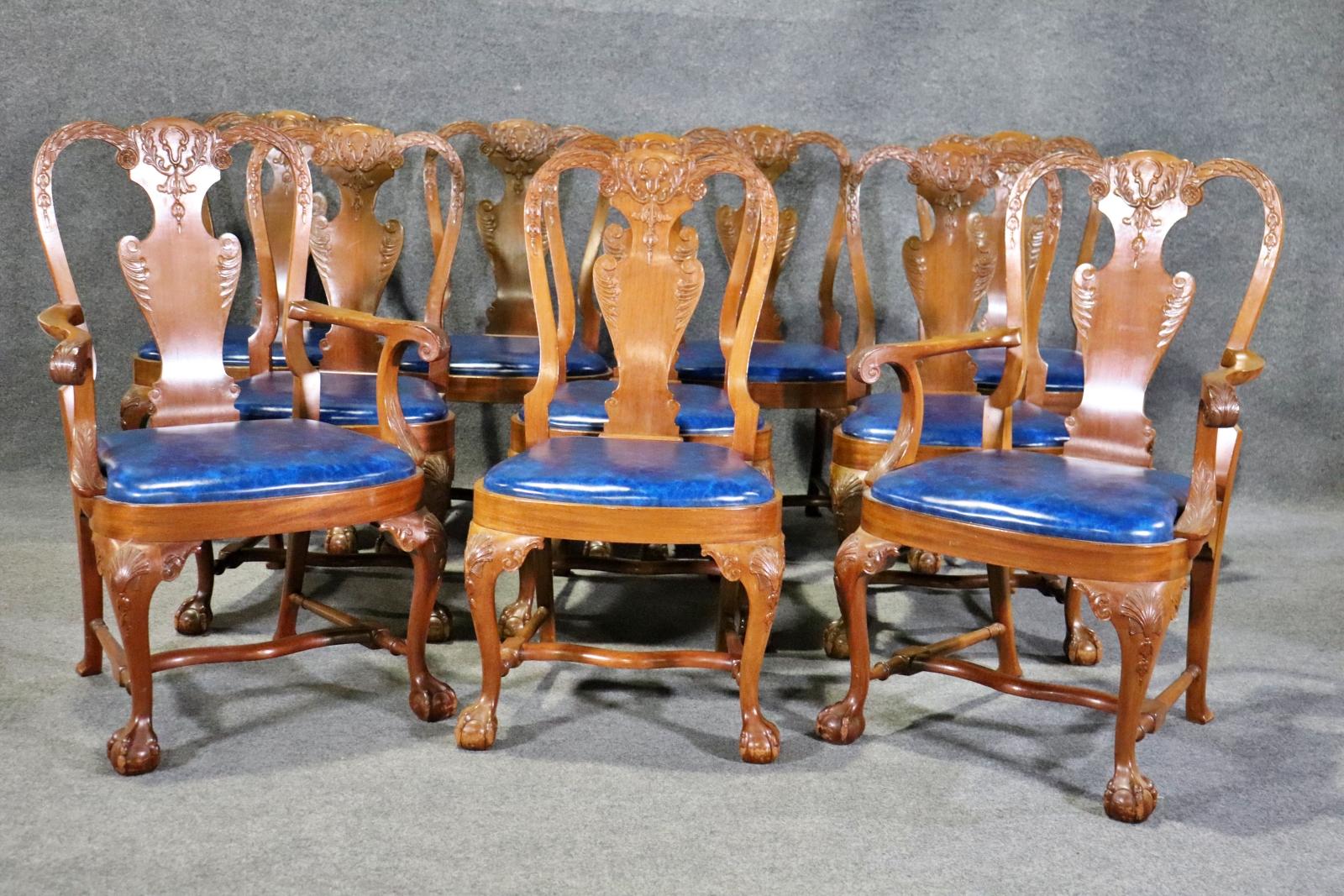 Matching dining table listed separately.

From Slatoff Estate. Ball and claw feet. Shell carved knees. Mahogany. 8 side chairs measure 39 1/4