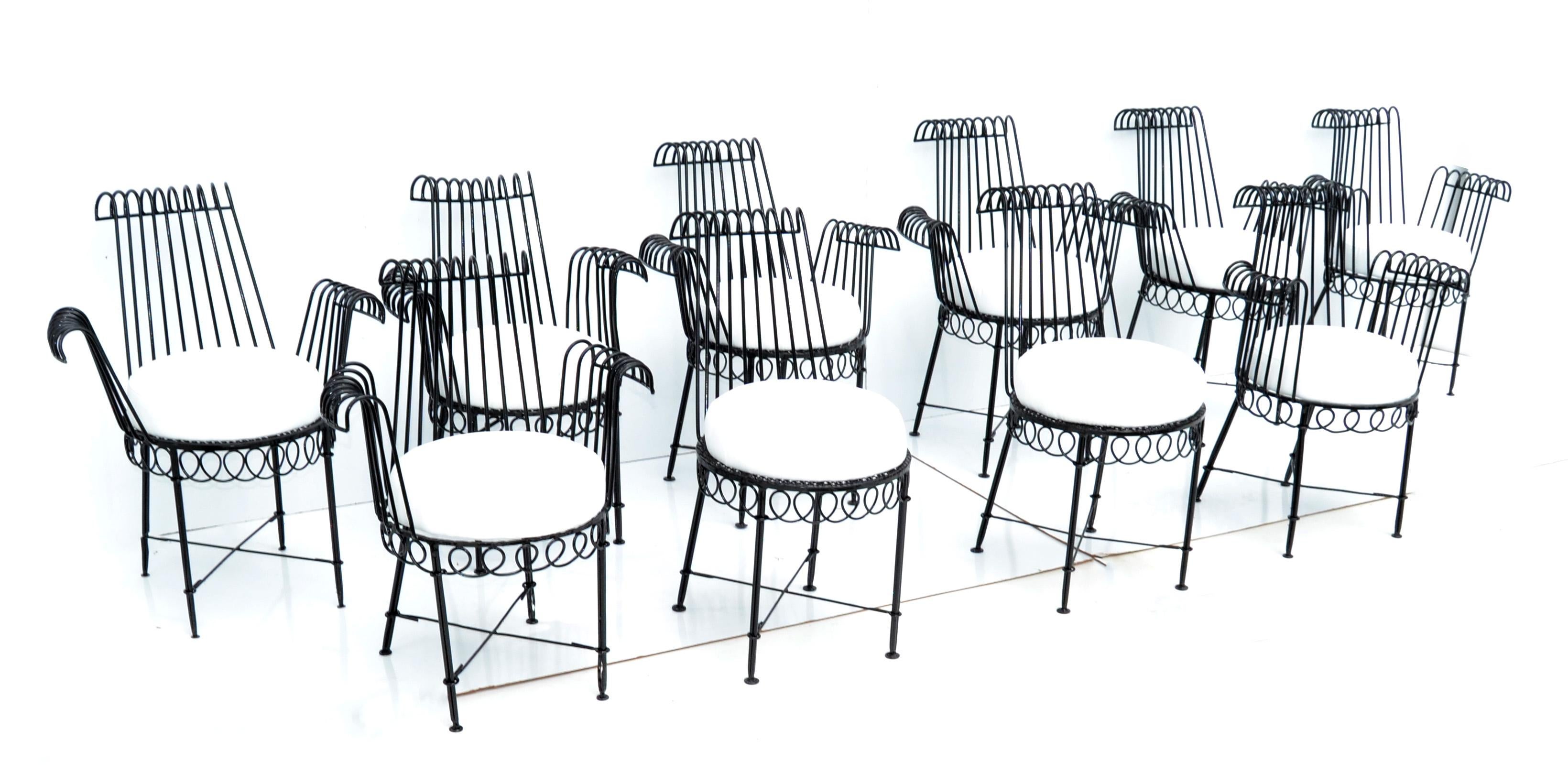Superb dining room set from Mathieu Matégot Design Cap d’ Ail from the 1950s and made in France.
The set contains 6 armchairs in stunning handcrafted wrought iron. 
Can be use inside or Outdoors as Patio and Garden Furniture, Restaurant, Bistro.