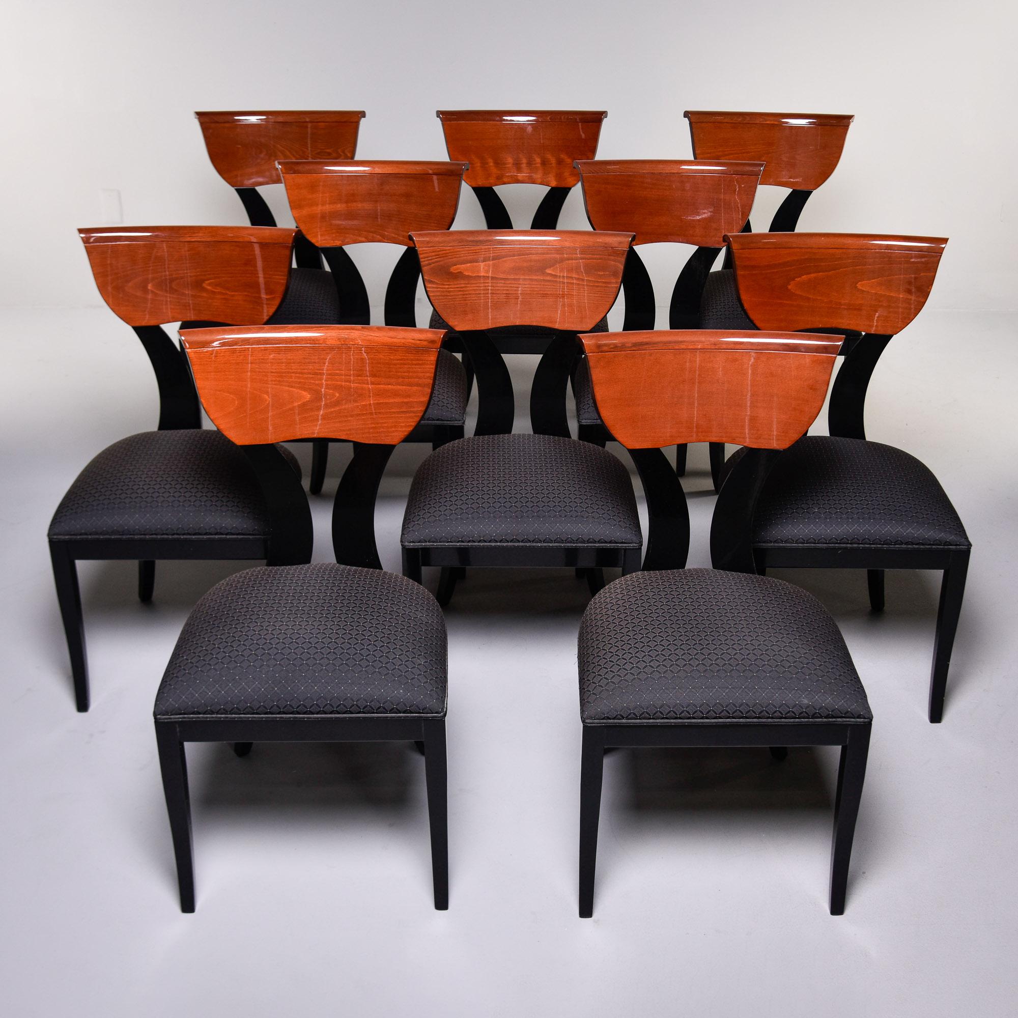 This set of ten vintage Italian dining chairs was designed by Pietro Costantini and dates from the early 1990s. Each chair is labeled and numbered on the underside of the seat. All original fabric and finishes which are in remarkable vintage