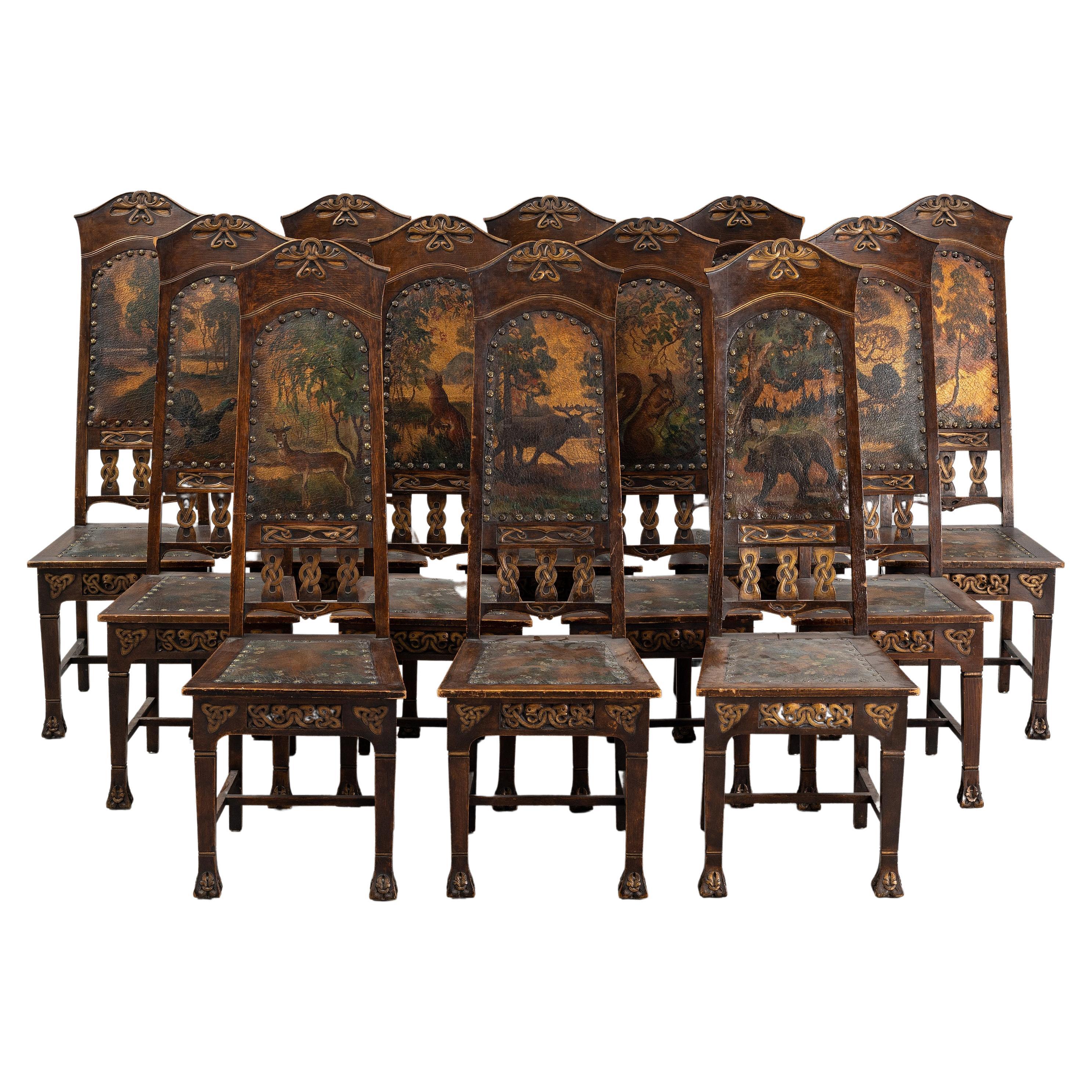 This is an extraordinary set of 12 Art Nouveaux dining chairs from Sweden, in solid oak, covered in hand-painted leather each one featuring a different animal in a natural setting on front and back. 
The leather is in excellent original condition