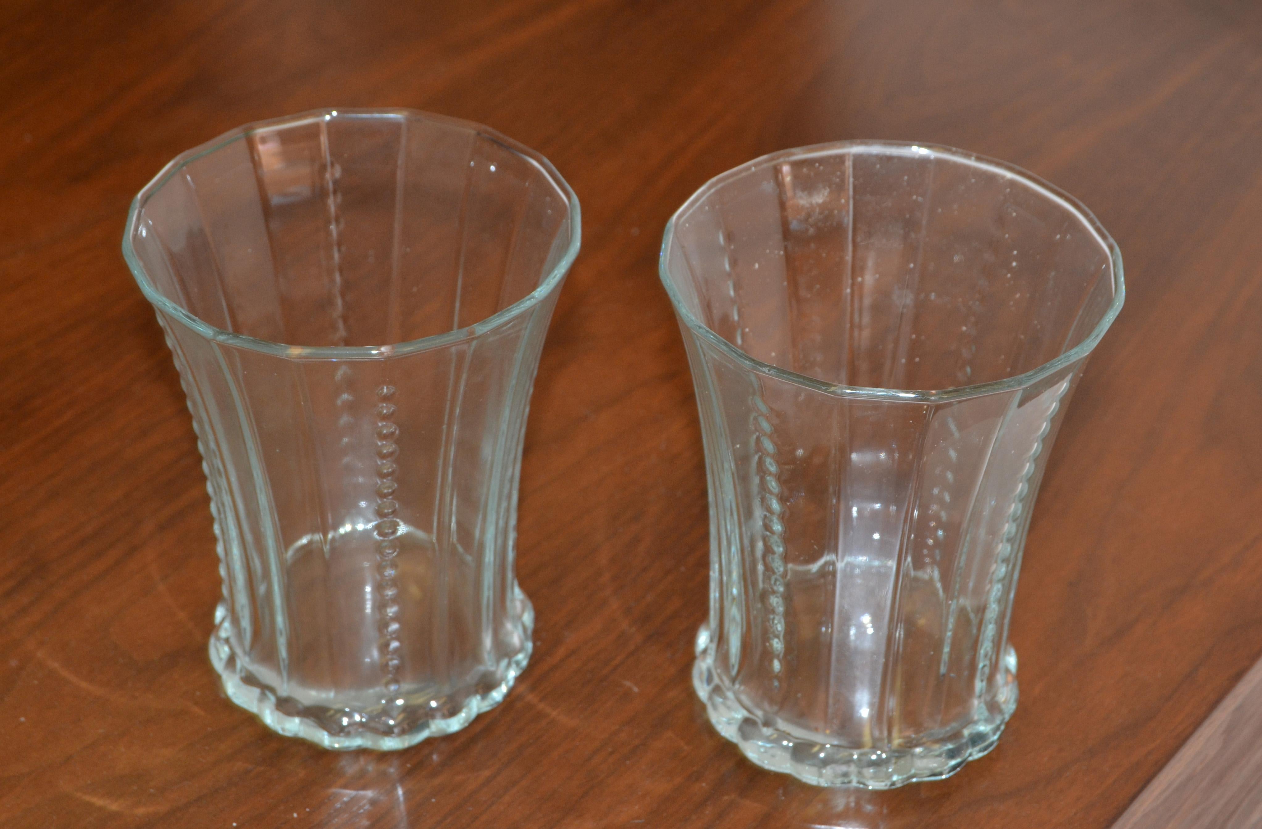 Set of 12 Mid-Century Modern heavy blown bubble glass drinking glasses, glassware, stemware made in Italy.
In excellent condition.
 
