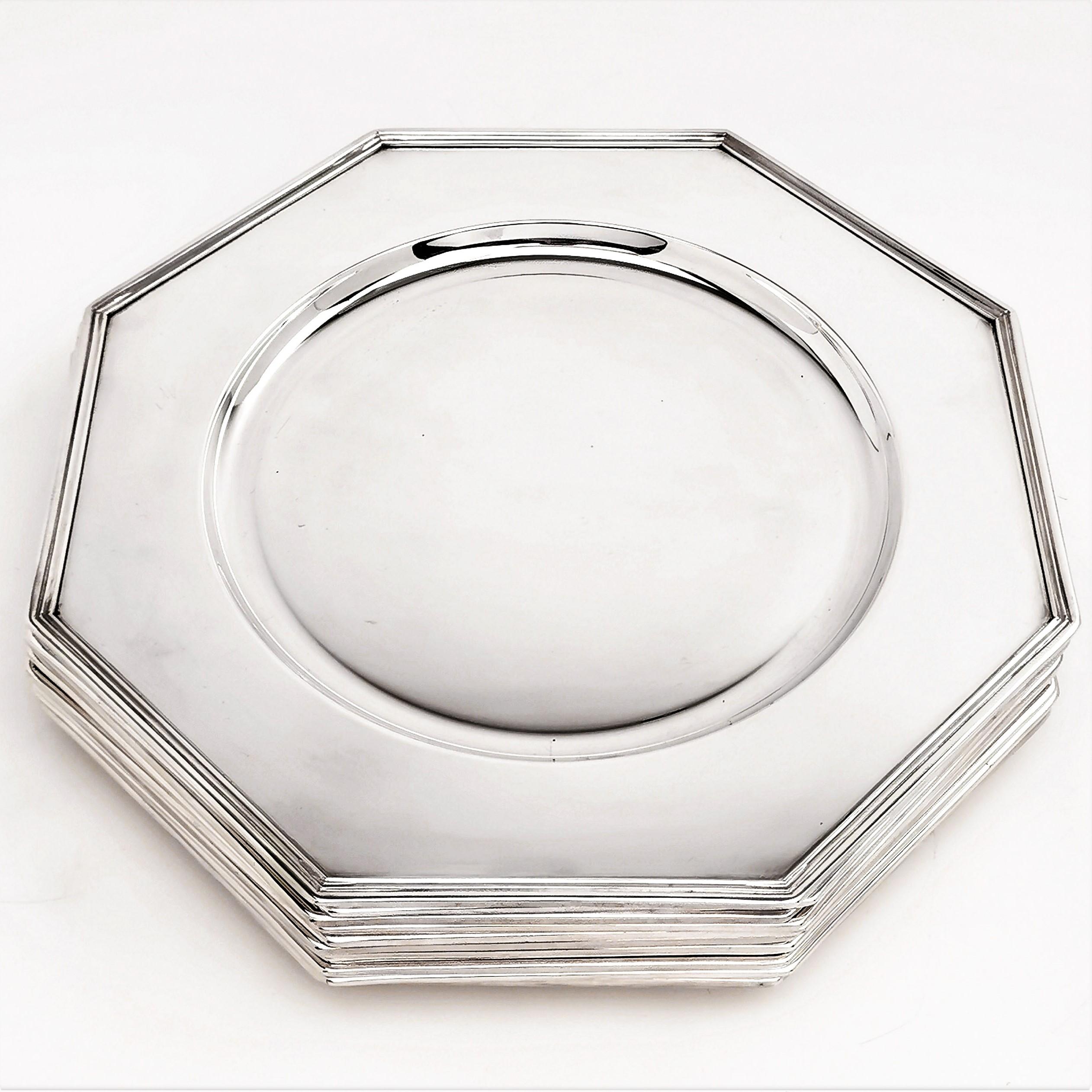 A beautiful set of 12 Solid Silver Octagonal Under Plates or Chargers. These gorgeous under plates have clean, modern lines to create an elegant look.

These chargers are created from 930 standard silver, a higher grade than is usual.

Made in Italy