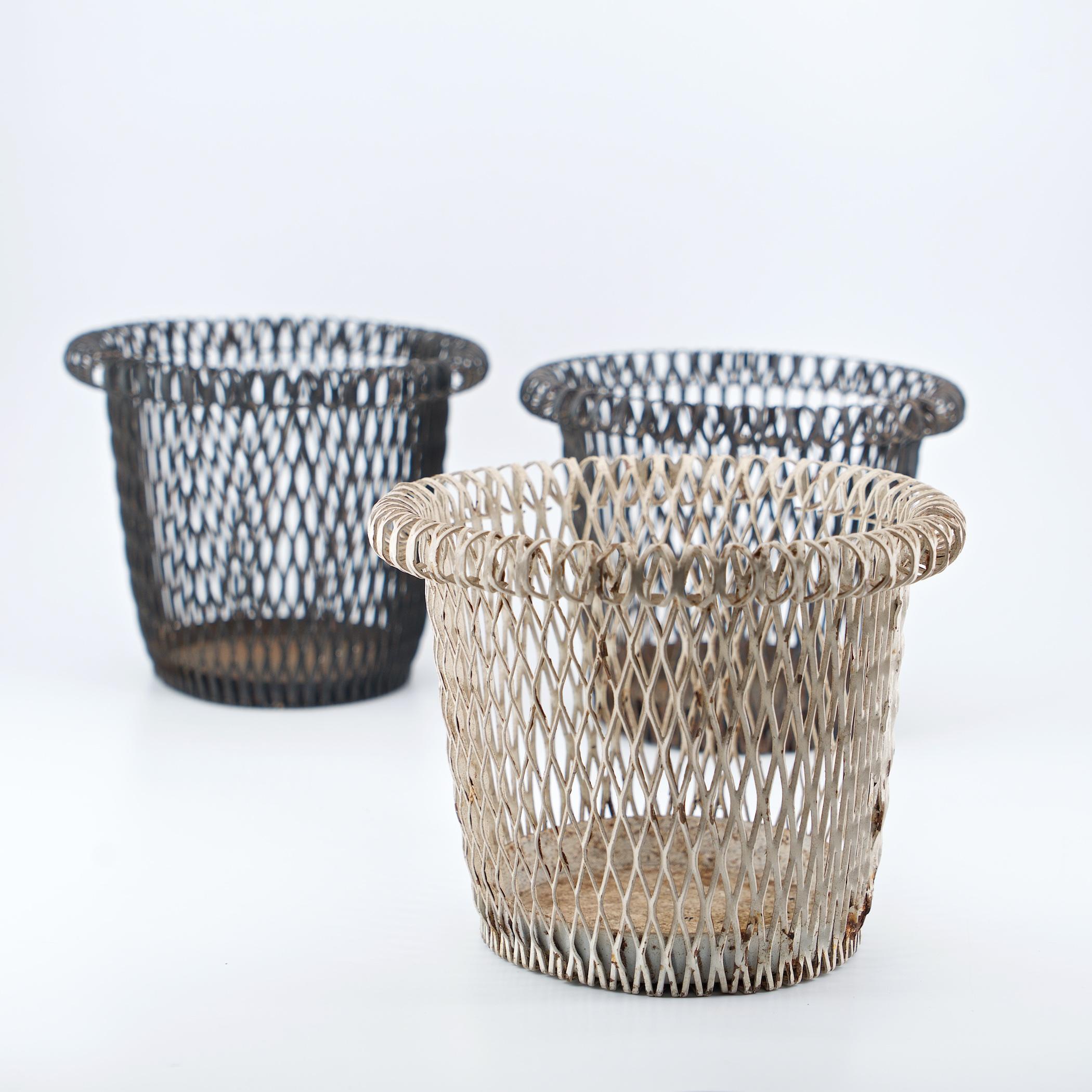 Hard to find, wonderful American made french inspired planter baskets, set of three included.