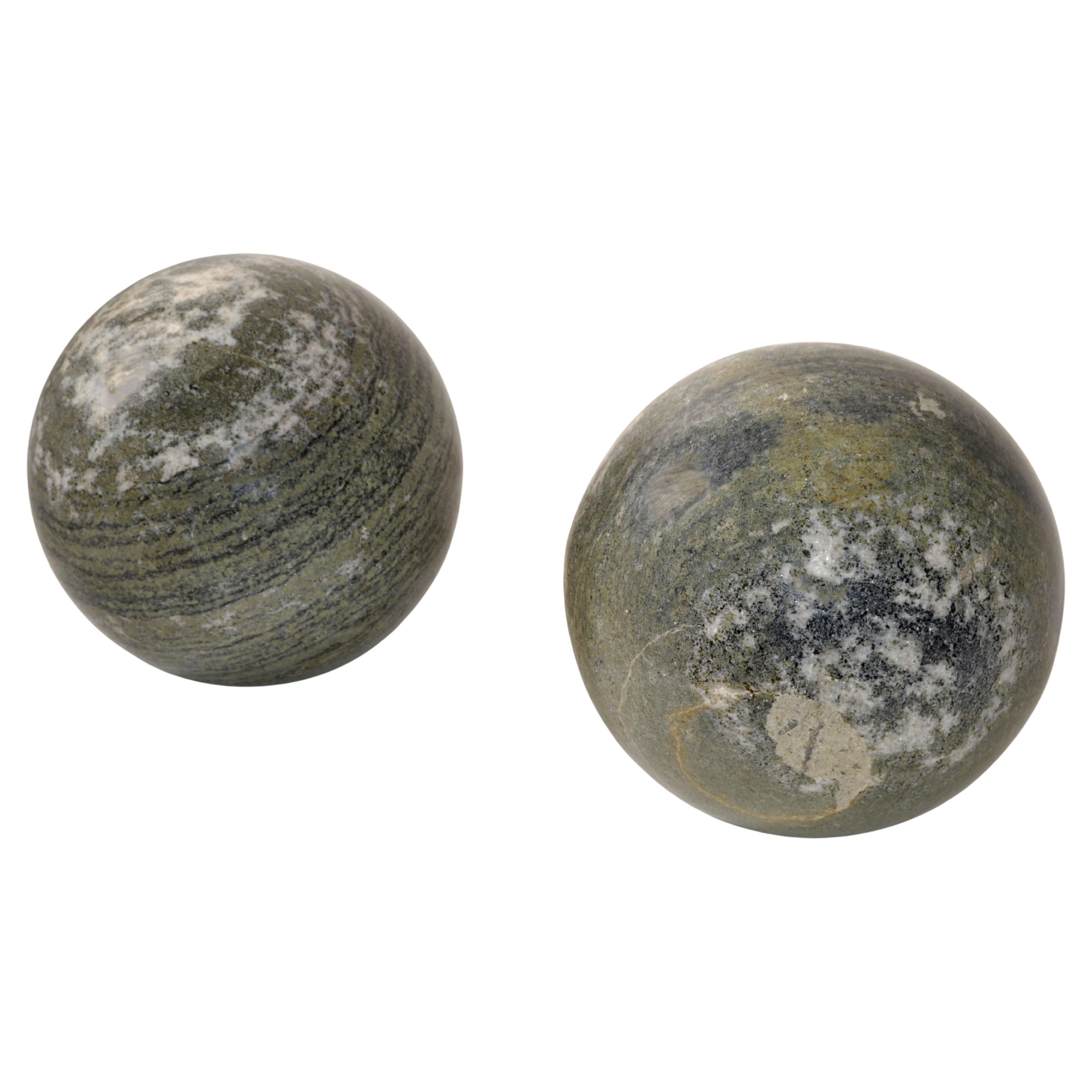 Two Italian 'Metafora' marble and onyx Sphere Ball Objects attributed to Lella and Massimo Vignelli for Martinelli Luce.
The two geometric hand shaped Sphere or Ball are Organic Natural made out of polished marble and onyx in warm tone earth