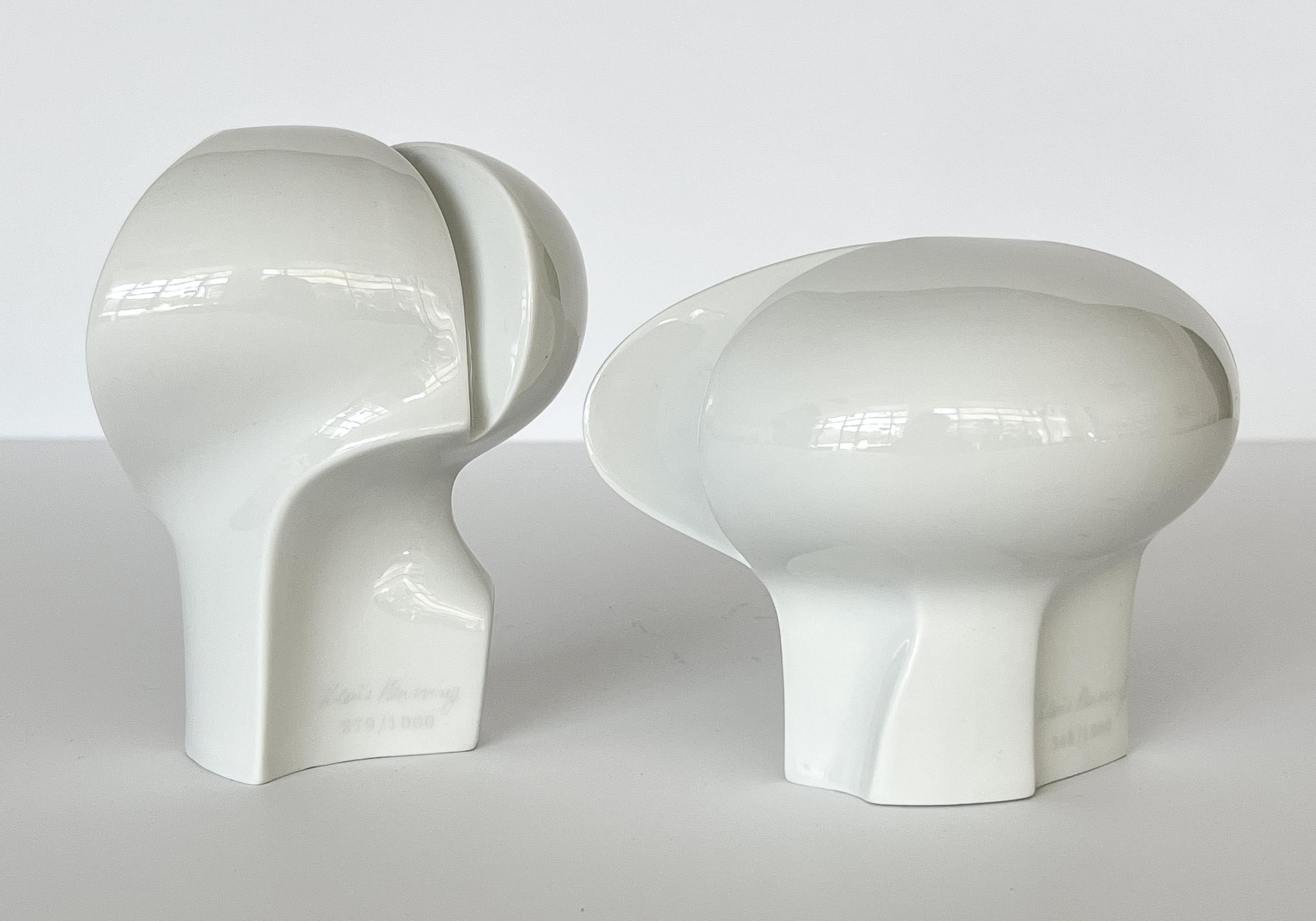 Rare set of two Klaus Henning abstract porcelain sculptures for Fürstenberg, West Germany circa 1960s. Glazed white porcelain abstract / Op Art sculptures. Limited edition of 1000 pieces each. Tall sculpture measures 6
