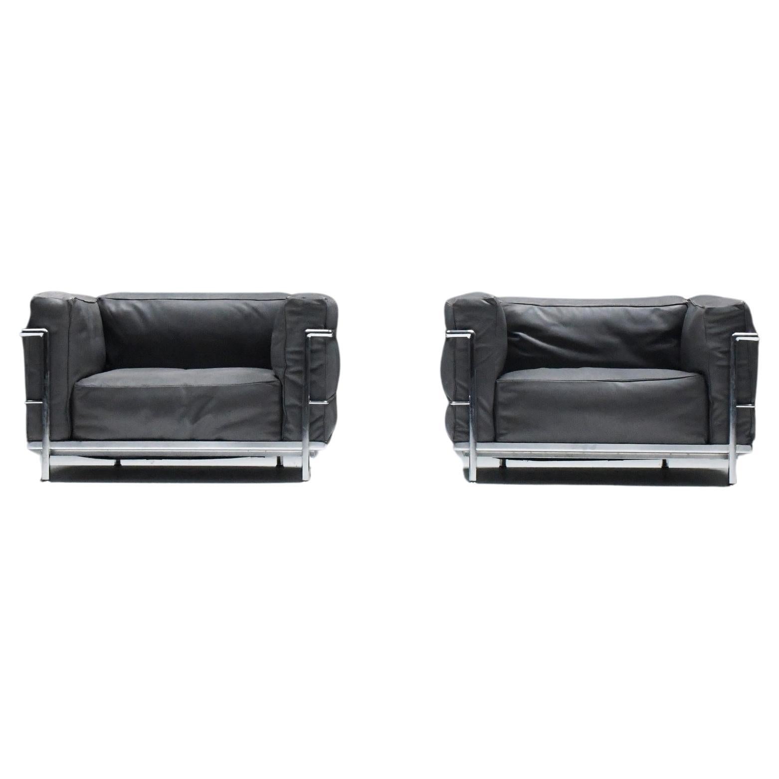 Set (2) LC 3 in grey leather by Le Corbusier, Jeanneret & Perriand for Cassina