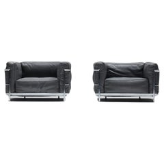Set (2) LC 3 in grey leather by Le Corbusier, Jeanneret & Perriand for Cassina