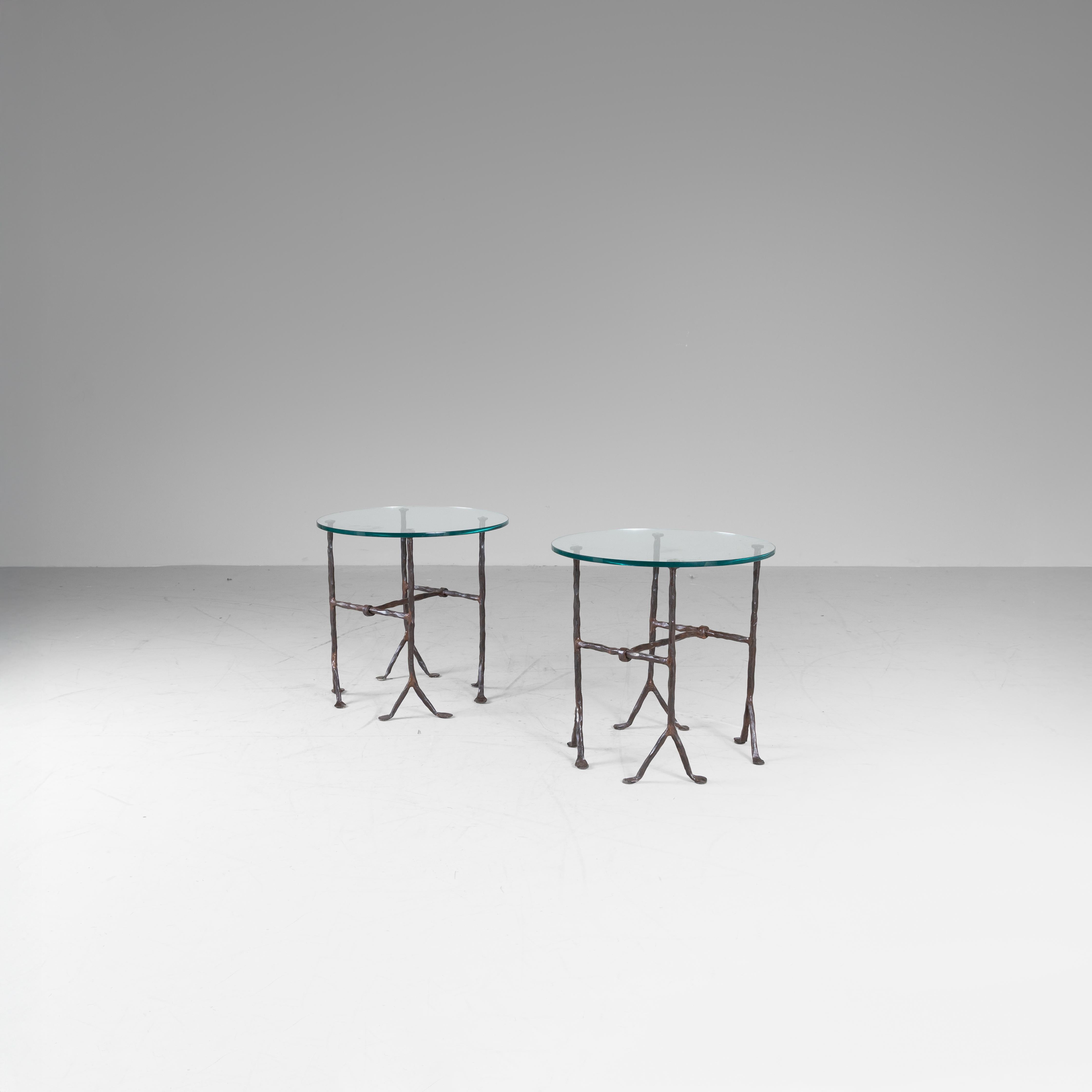 Ensemble de 2 tables basses, Garouste & Bonetti, France, vers 1990.  
Cadre en fer forgé à la main et plateau en verre transparent. L'esthétique sculpturale et le design organique témoignent de la vision poétique et sophistiquée du célèbre duo