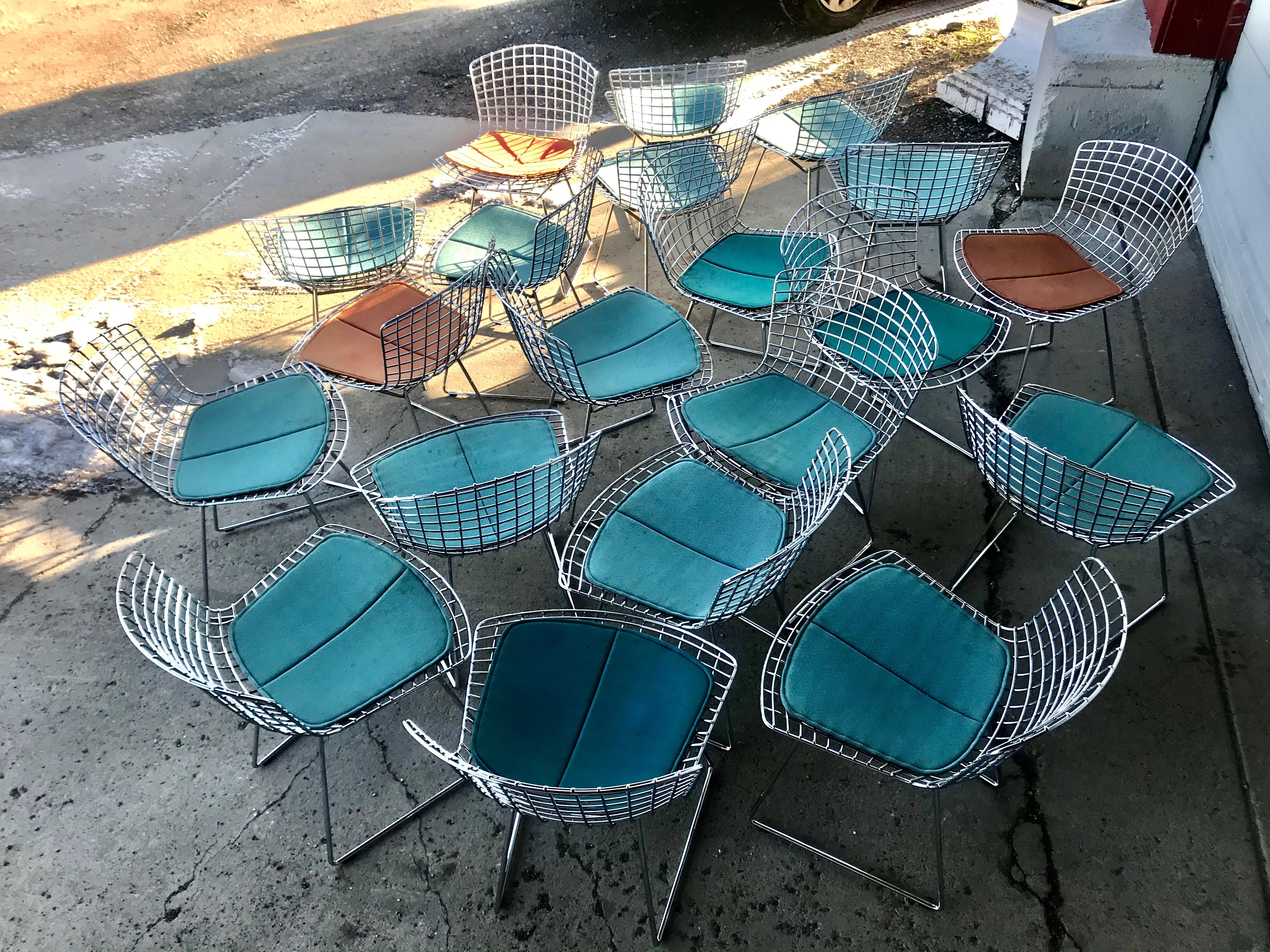 20 vintage chrome side chairs designed by Harry Bertoia manufactured by Knoll, nice original condition, some soiling to original seat pads, minor surface rust, Classic modernist design. Hand delivery avail to New York City or anywhere en route from