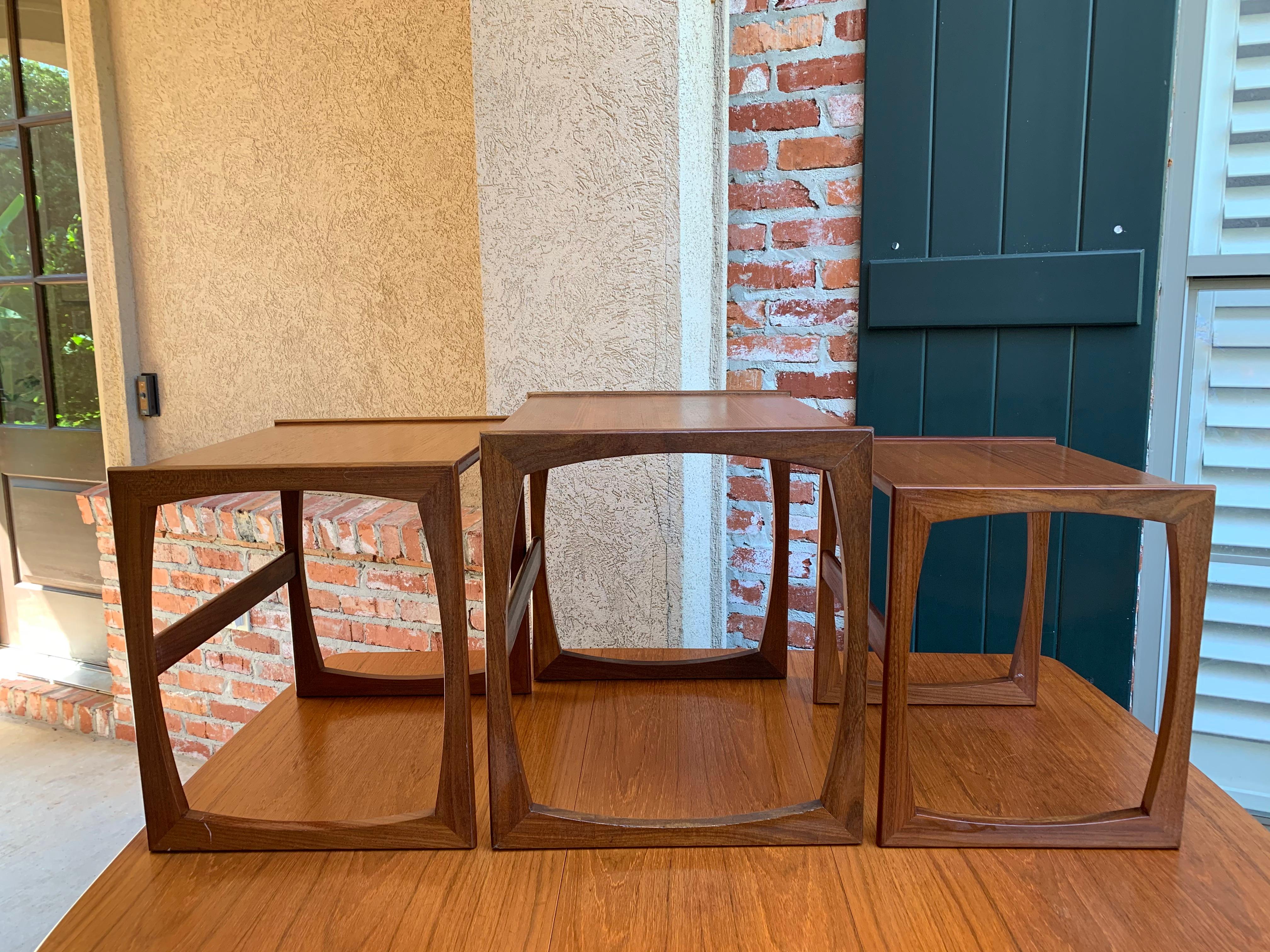 Direct from England, a lovely set of 3 nesting tables~
~Mid-Century Modern styling with gorgeous teak veneer~
~circa 1960~
(Note: We recently purchased several of these Mid-Century Modern nesting tables and dining tables as well as some