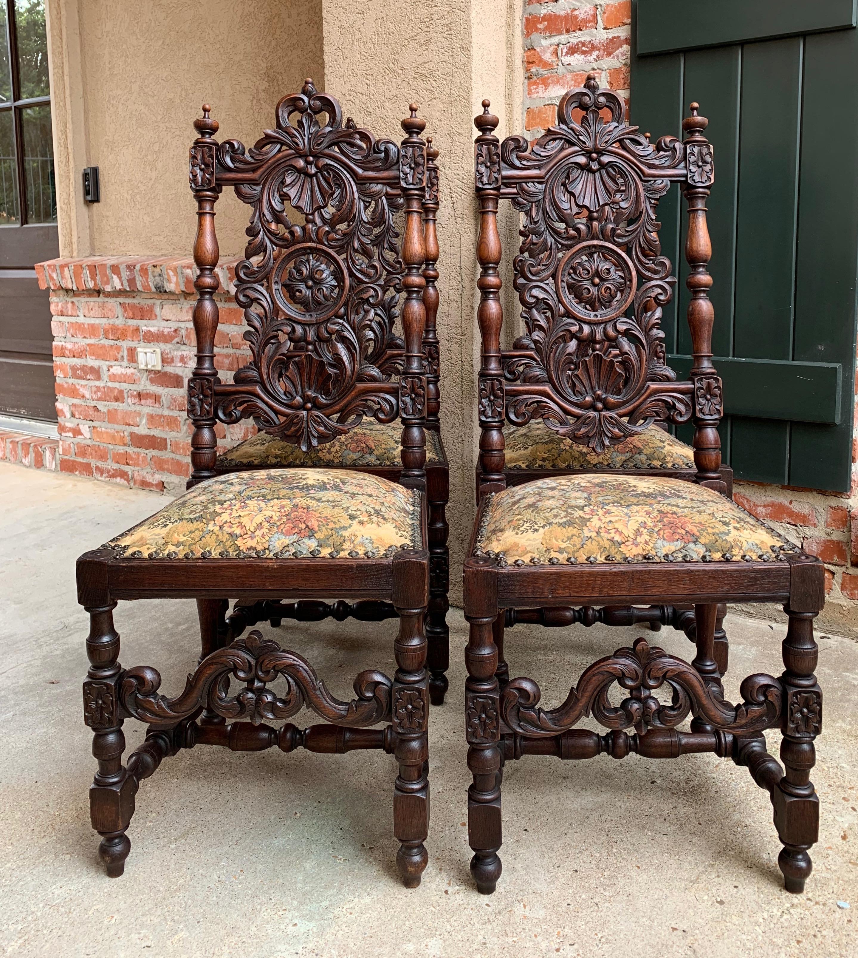 Direct from France, a set of 4 large antique French carved arm chairs with beautiful carved features and elegant silhouette!~
~High open carved upper rail with large open carved shell and foliate/scroll splat and thick, turned stiles!~
~The