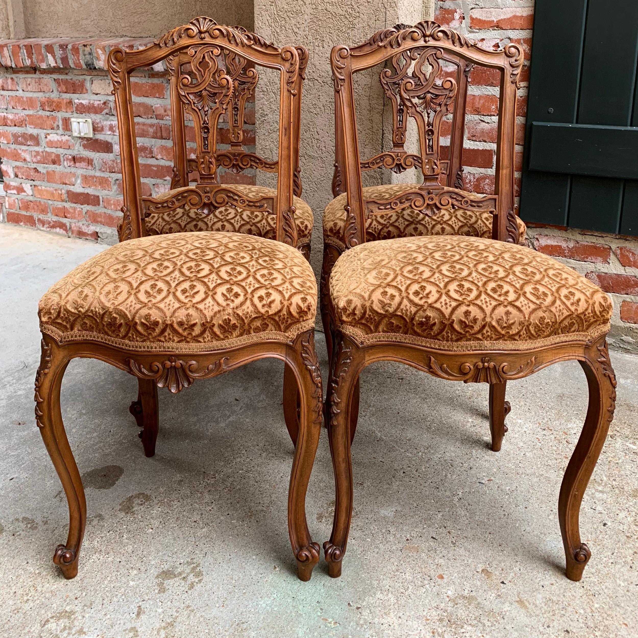 Set of 4 Antique French petite chairs - carved walnut Louis XV slipper or vanity size.

~Direct from France~
~Lovely set of 4 antique French carved walnut chairs, in a very petite size!~
~Highly carved walnut crest rail and pierced