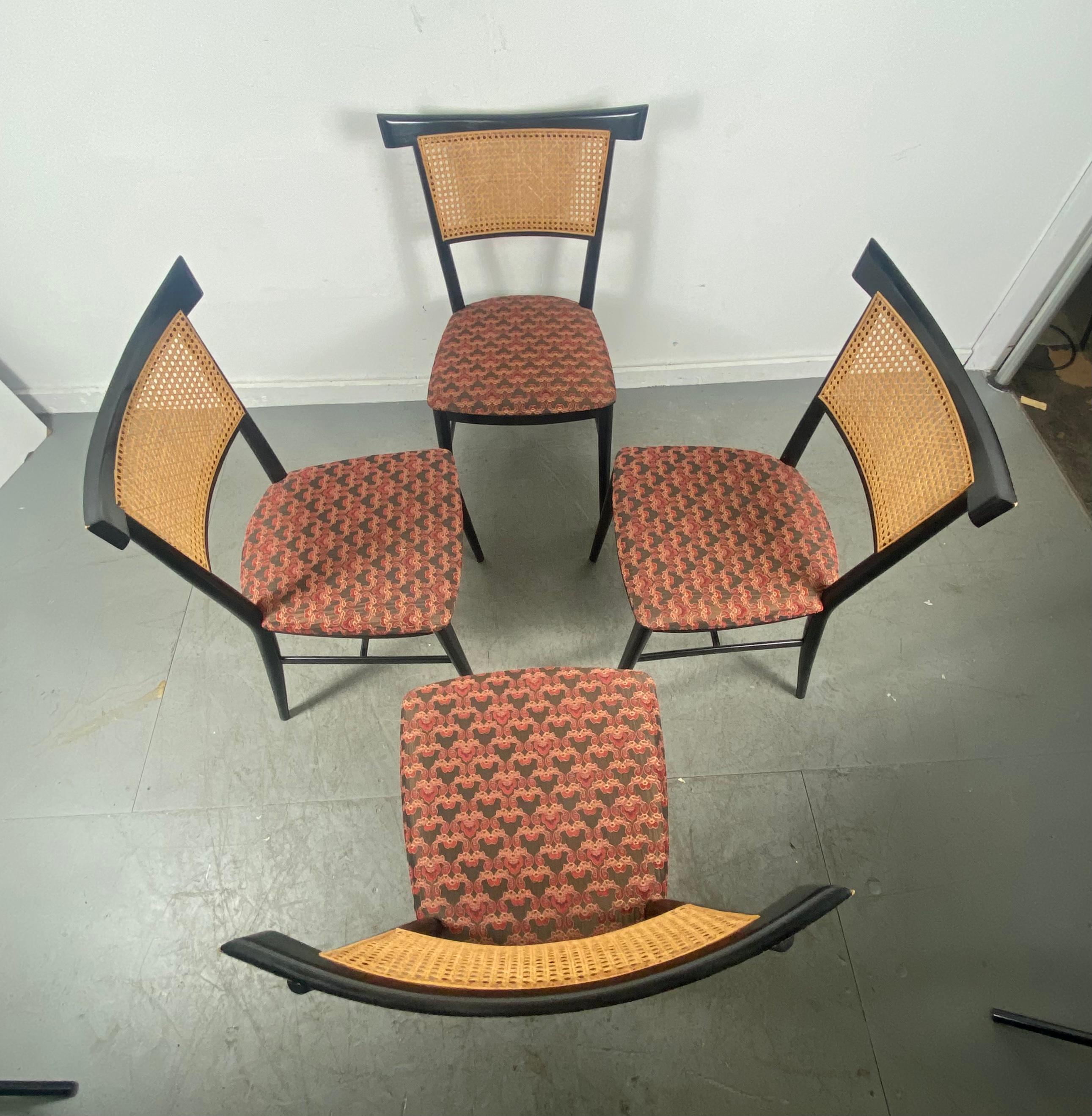 Stunning set 4 Pagota side chairs designed by Paul McCobb. Retains original black lacquer finish. Minor wear, also retains original caning, seats recently reupholstered. Classic design, hand delivery avail to New York City or anywhere en route from