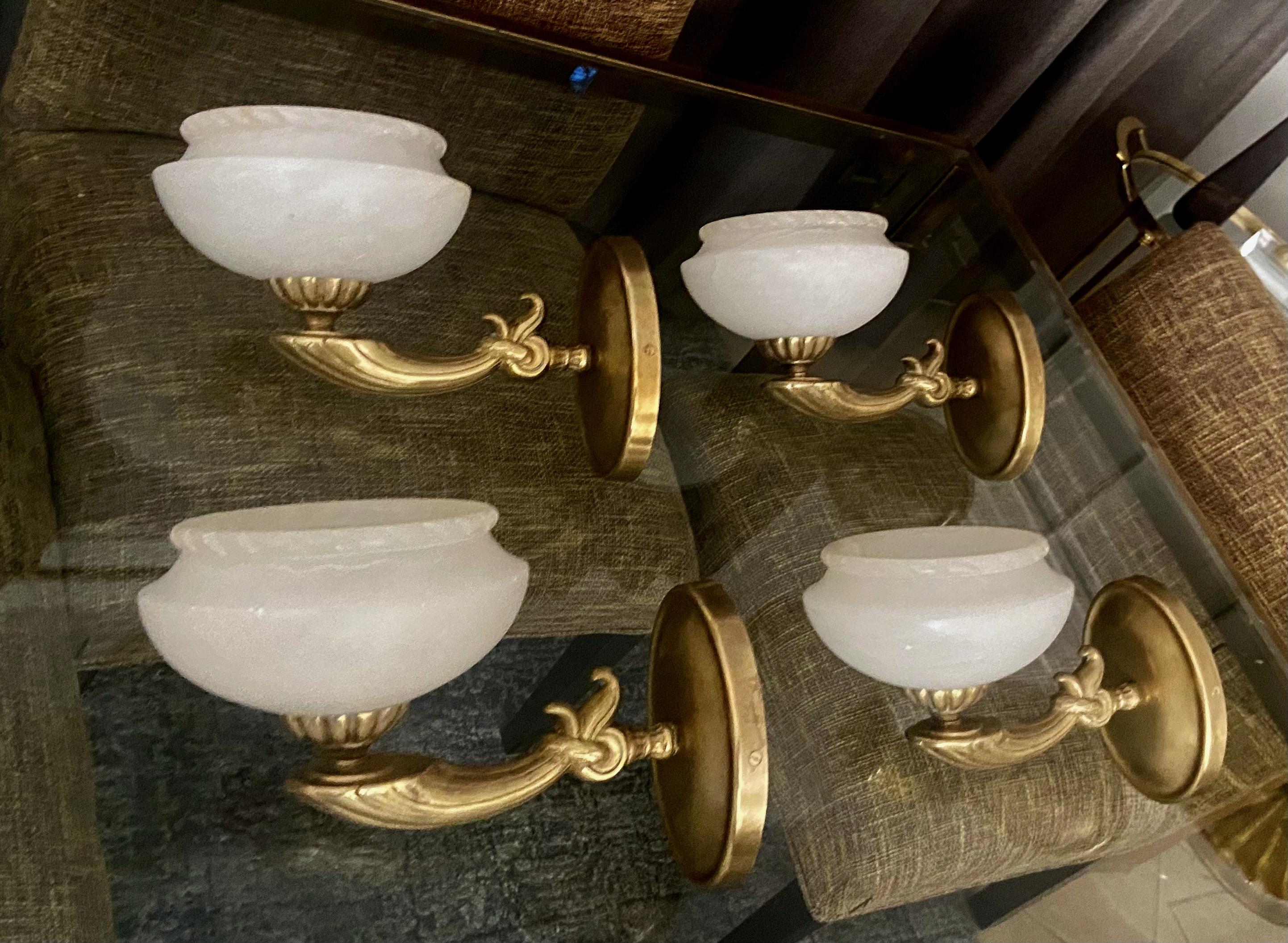 Set 4 (four) brass French style wall sconces with alabaster globe shades. Each uses single regular A base bulb. Diameter of alabaster bowl 8