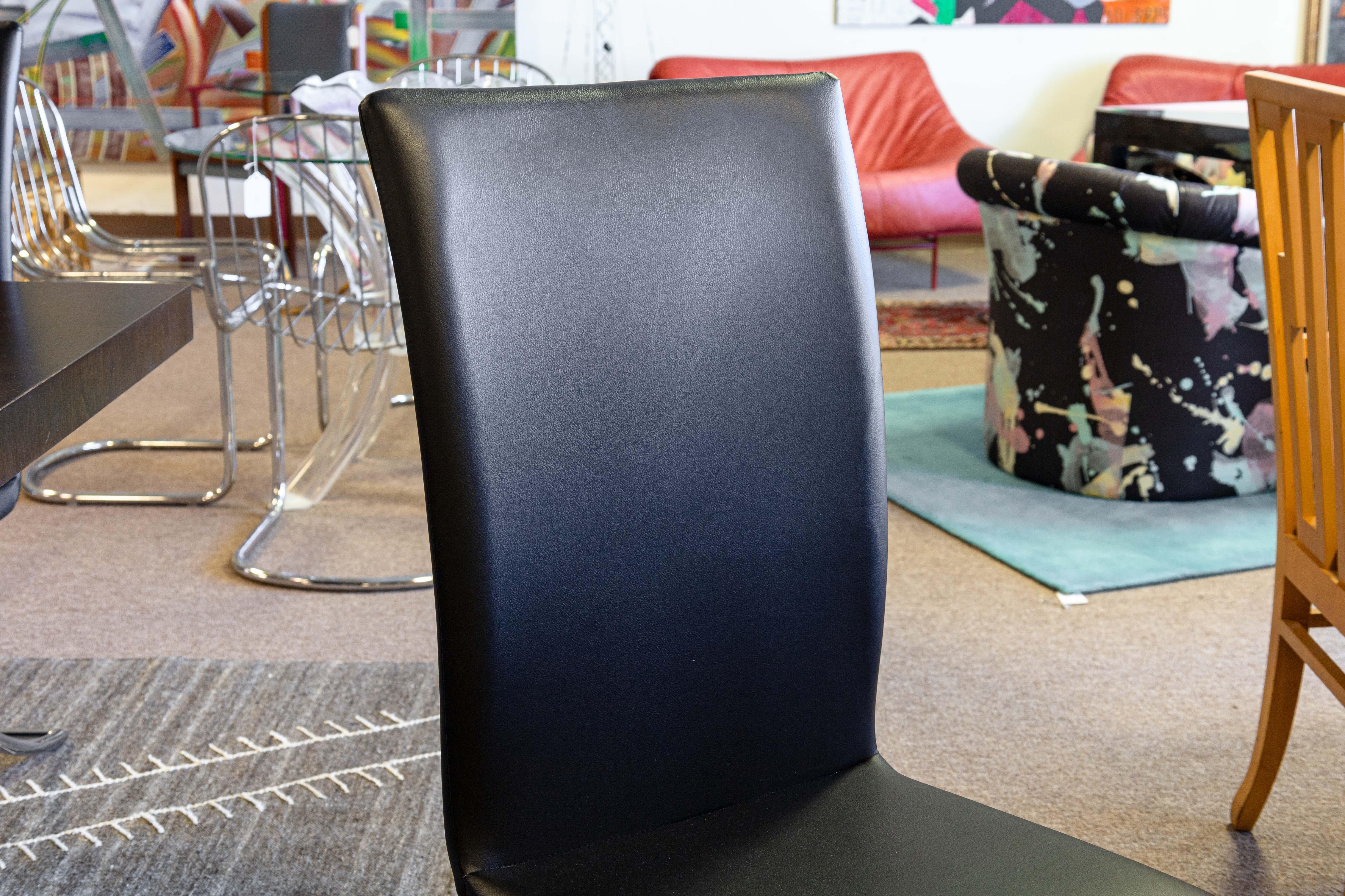 Set 4 Chrome Steel and Black Naugahyde Vinyl Contemporary Modern Dining Chairs In Good Condition For Sale In Keego Harbor, MI