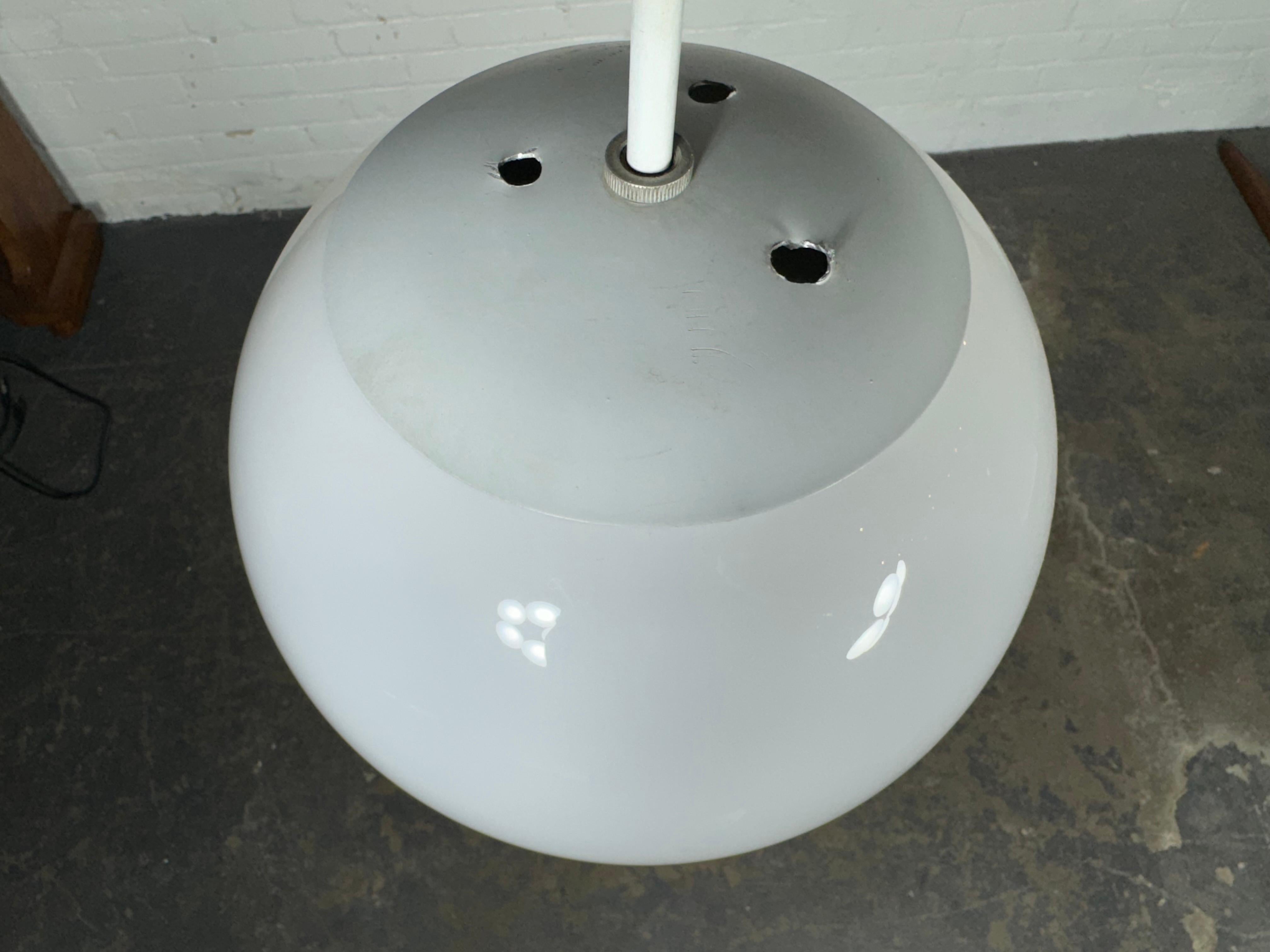 Classic Ball Prescolite pendant fixture with white glass globe, circa 1950s
- Appears to be all original 
- good condition
- 28