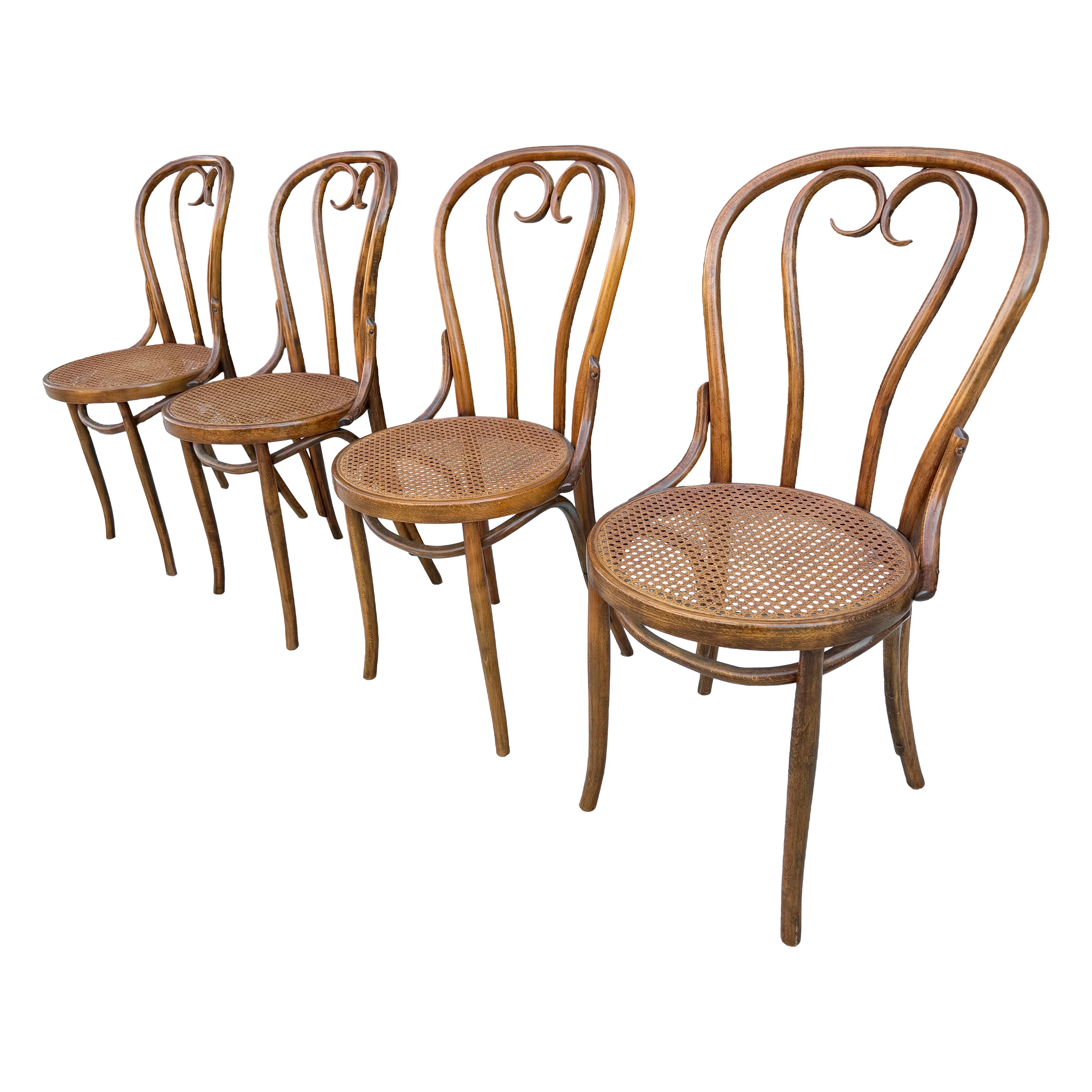 Set 4 Classic Thonet" Sweetheart" bentwood and cane cafe chairs..