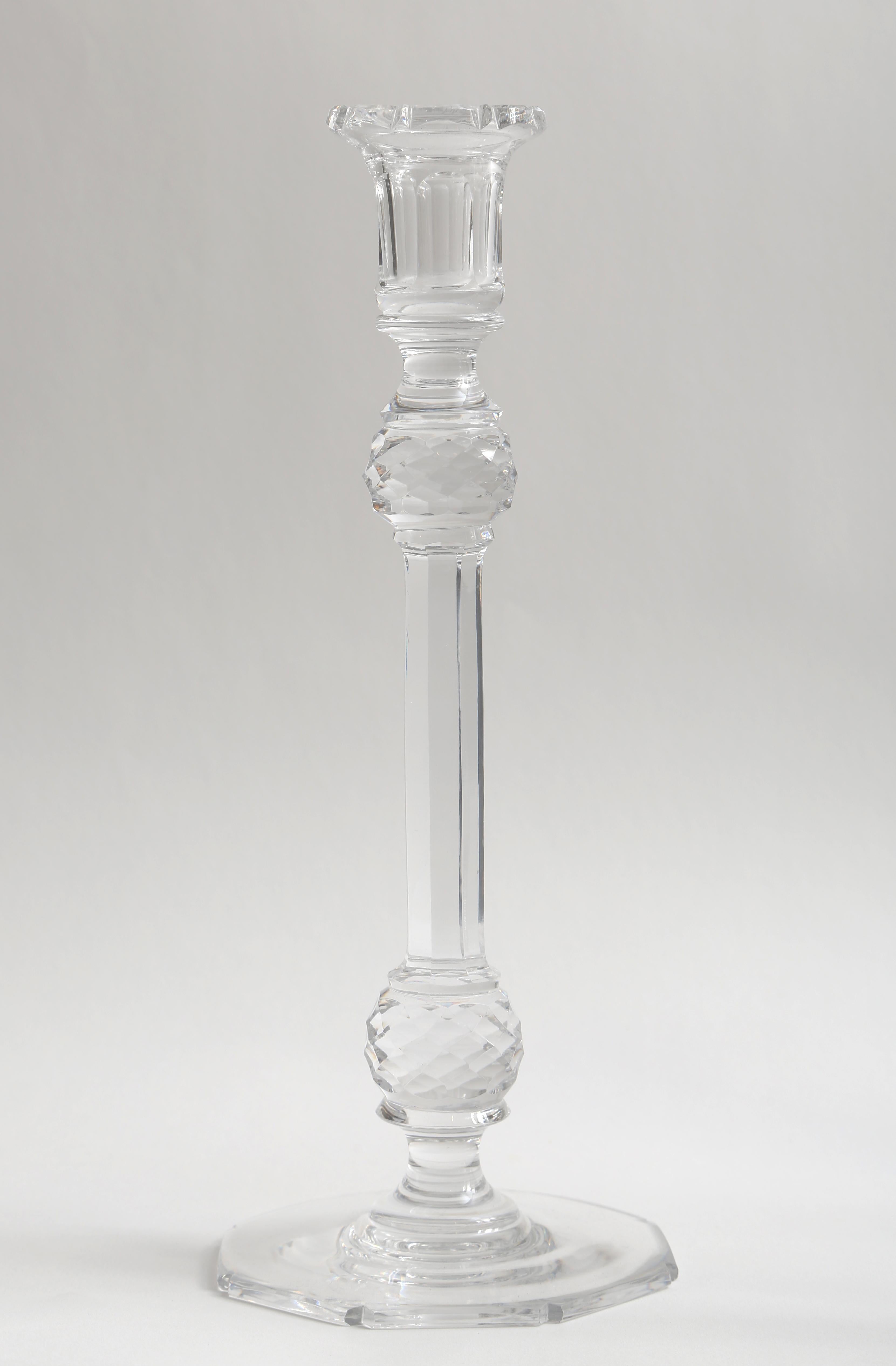 An elegant design of by one of the premier glass factories of Belgium, Val St Lambert. A tall cut knob just under the bobeche and also at the base with a simply cut shaped base. Wonderful vintage condition.
