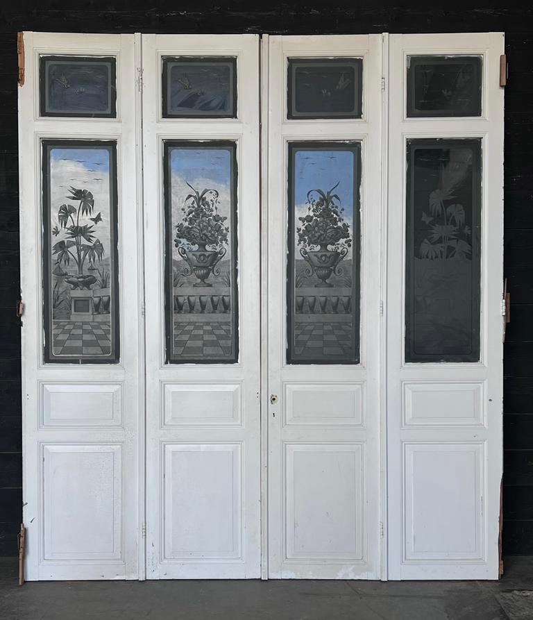 A lovely set of 4 French 19th Century Reclaimed Chateau doors, from a Chateau in the Loire region. The glass is all perfect. You can see 2 slivers of wood broken off that we have and can be reattached when you use them for your project. 
Height 285