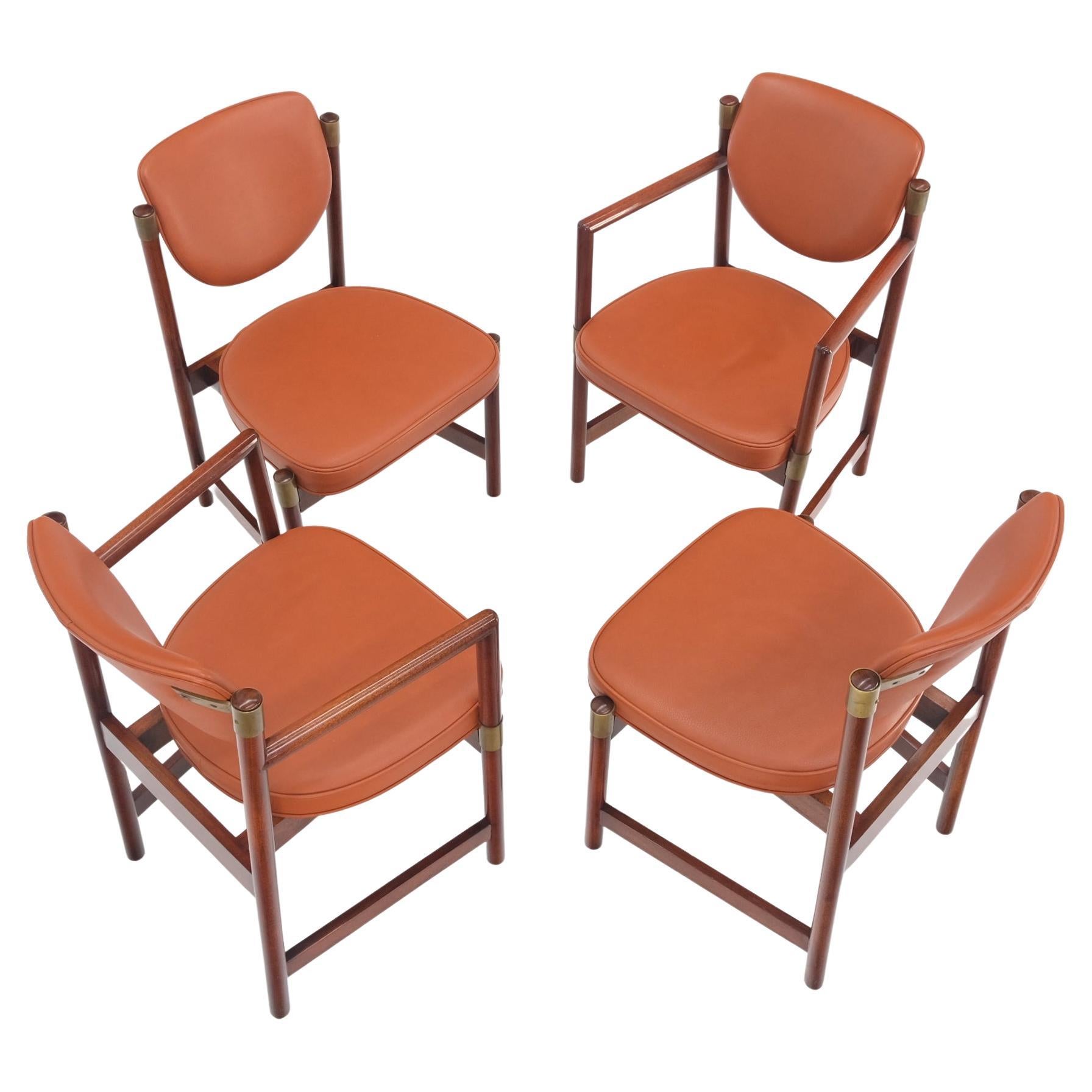 Set 4 Grossfeld House Brick leather Upholstery Brass Accents dining chairs.
Nice match for a game table set.