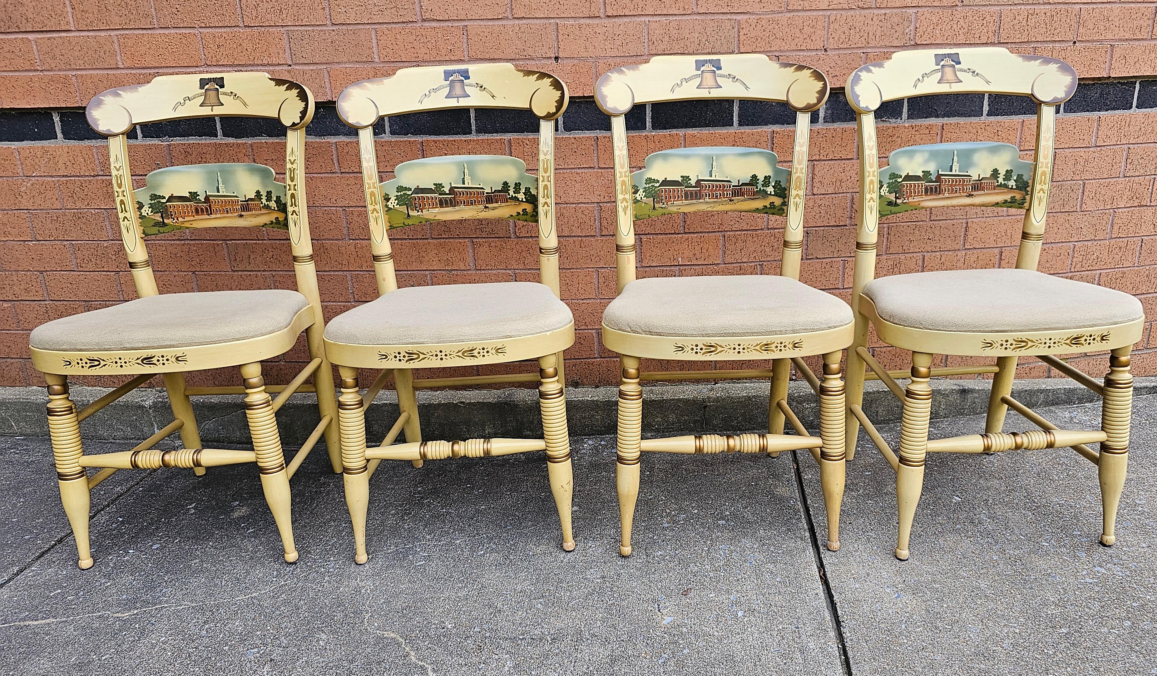 Fabulous Set Of Four Hitchcock Chair Company For Strawbridge & Clothier 'The Independence Chairs, Philadelphia', Limited Edition of 400. Great vintage condition. Creamy color with beige upholstery. Hand Painted independance bicentenary limited