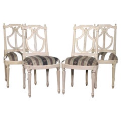 Ensemble de 4 chaises de salle à manger à dossier lyre peintes de la Maison Jansen Circa 1950