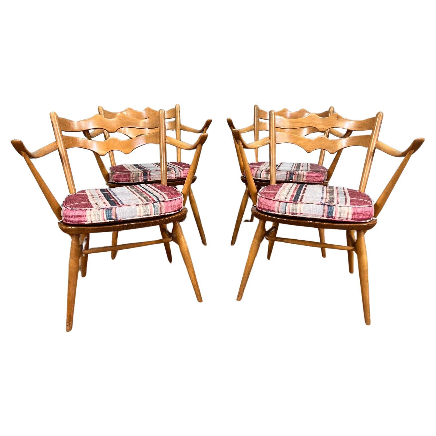 Set of four Ercol arm chairs in beech wood
These are the batwing model number 793
Great look to this set of Mid Century chairs circa 1960s
Ercol is renowned for its timeless furniture designs that seamlessly blend craftsmanship, functionality, and