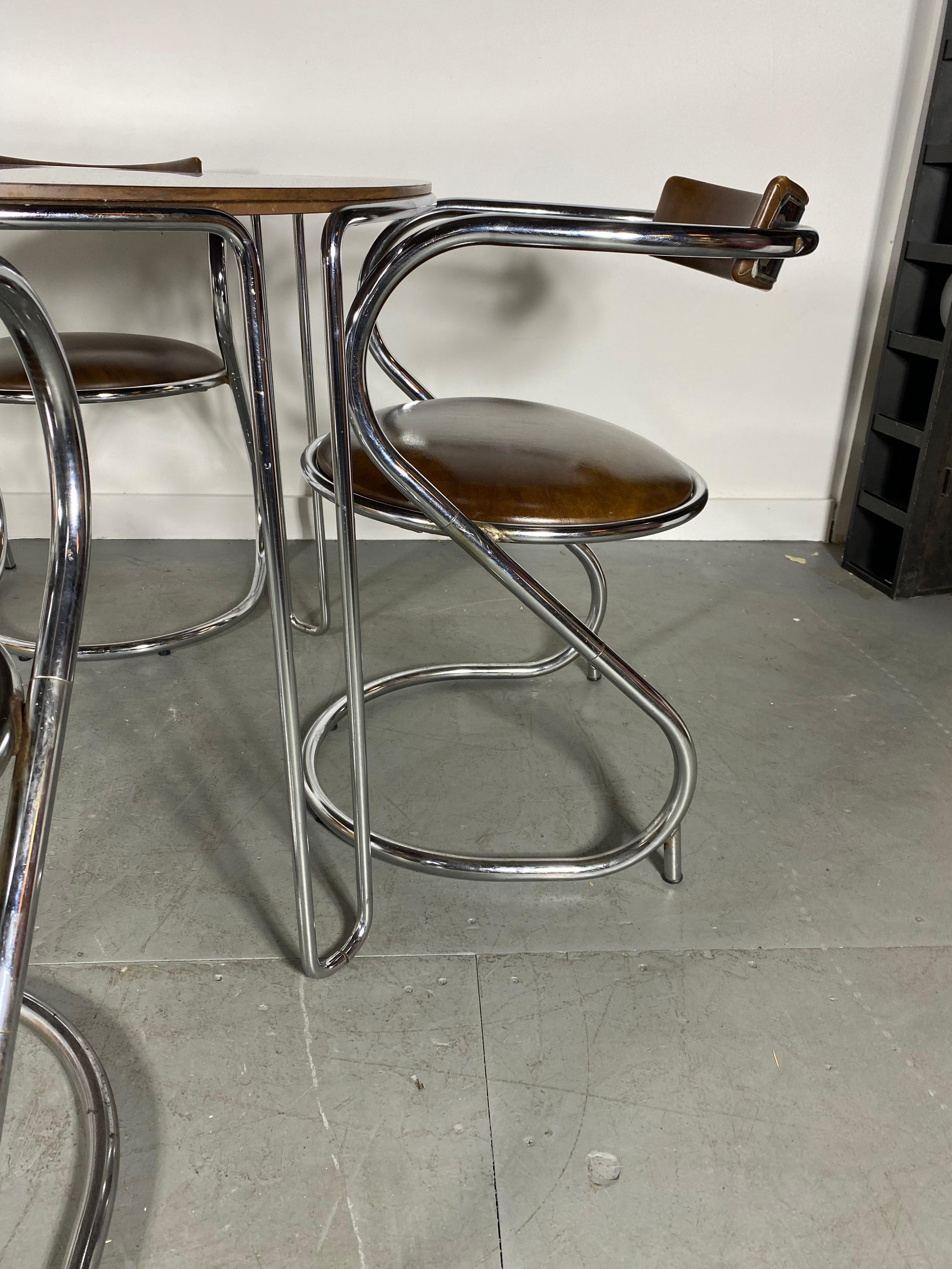 Stunning Set of 4 Modernist Chrome Cantilever Chairs by Etowah Mfg, Bauhaus / Art Deco,, Super stylize d. Amazing original condition. Extremely comfortable. Superior quality and construction.Listing for CHAIRS ONLY. Please see additional listing for