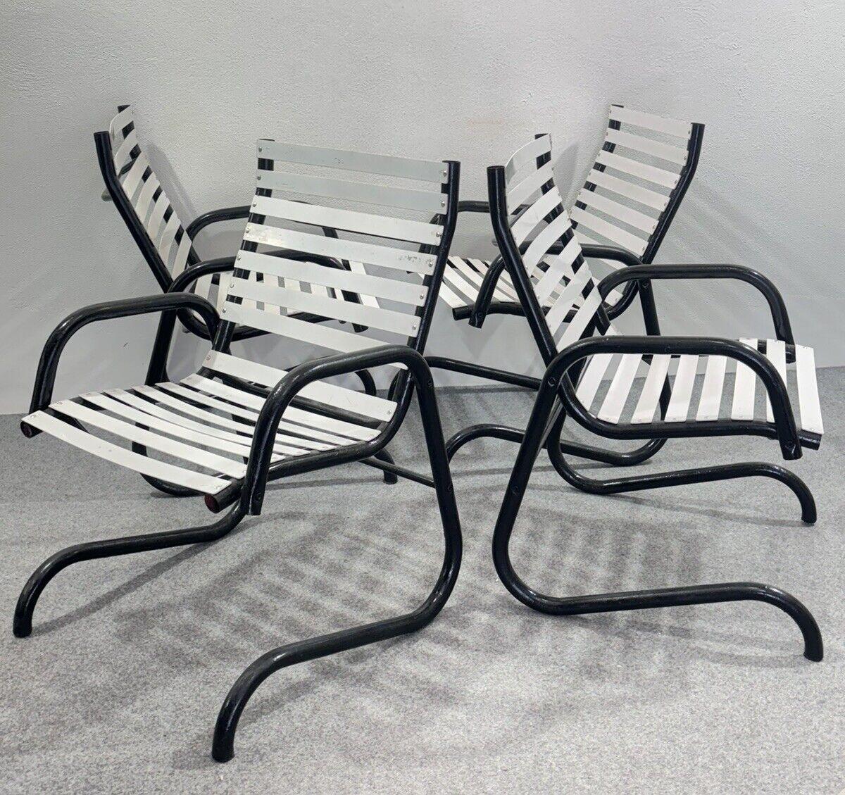 Set 4 Postmodern Garden Armchairs Modern Design 1980's.

Black curved metal frame.

Item is in good conservative condition, slight signs of time present due to use and age. (Please see photos)

Height 90 cm

Width 64 cm

DEPTH 66 cm