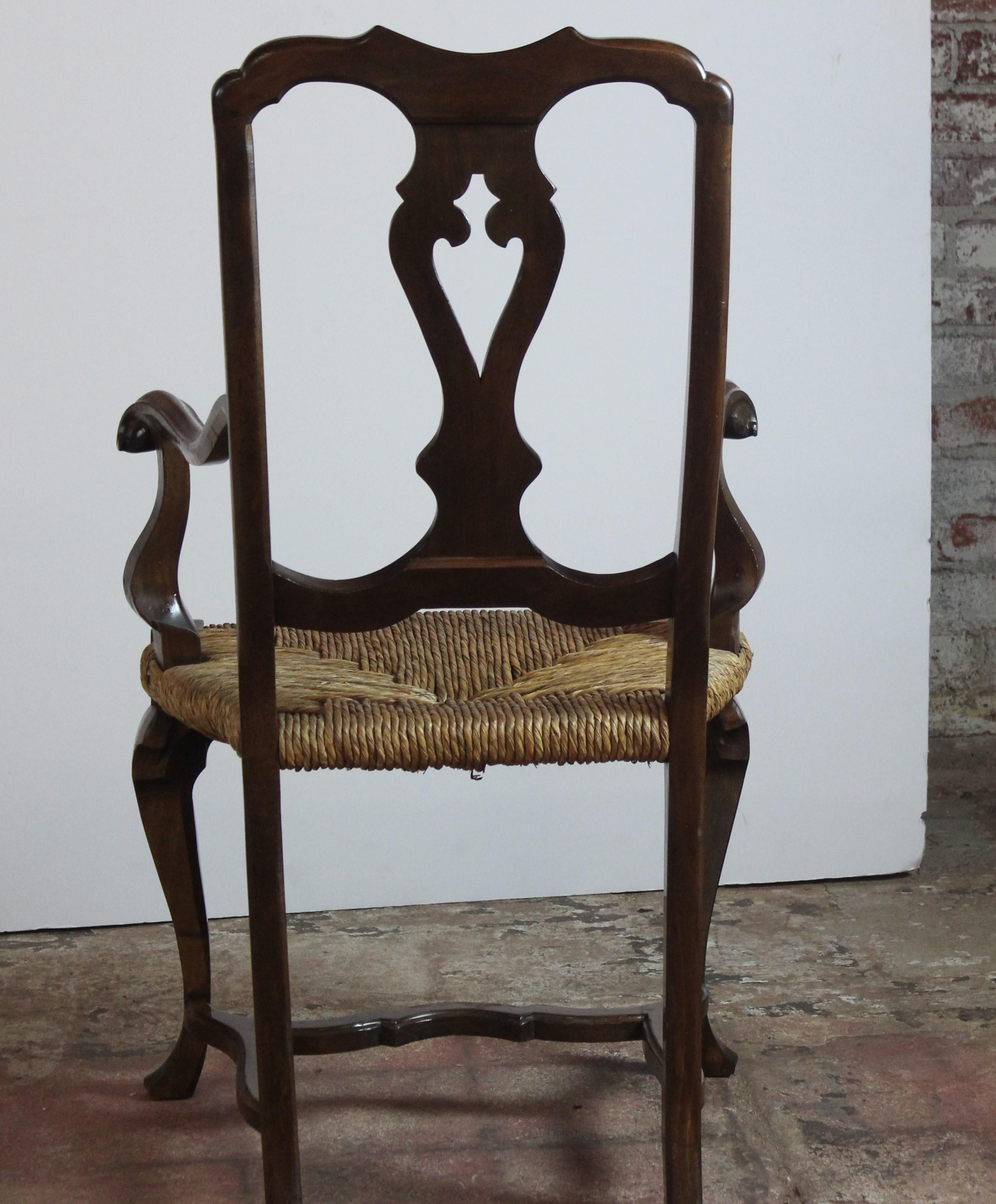 Vary good quality set of four rush seat chair. Grain on the wood excellent and quality workman ship. Arm chair 22.50