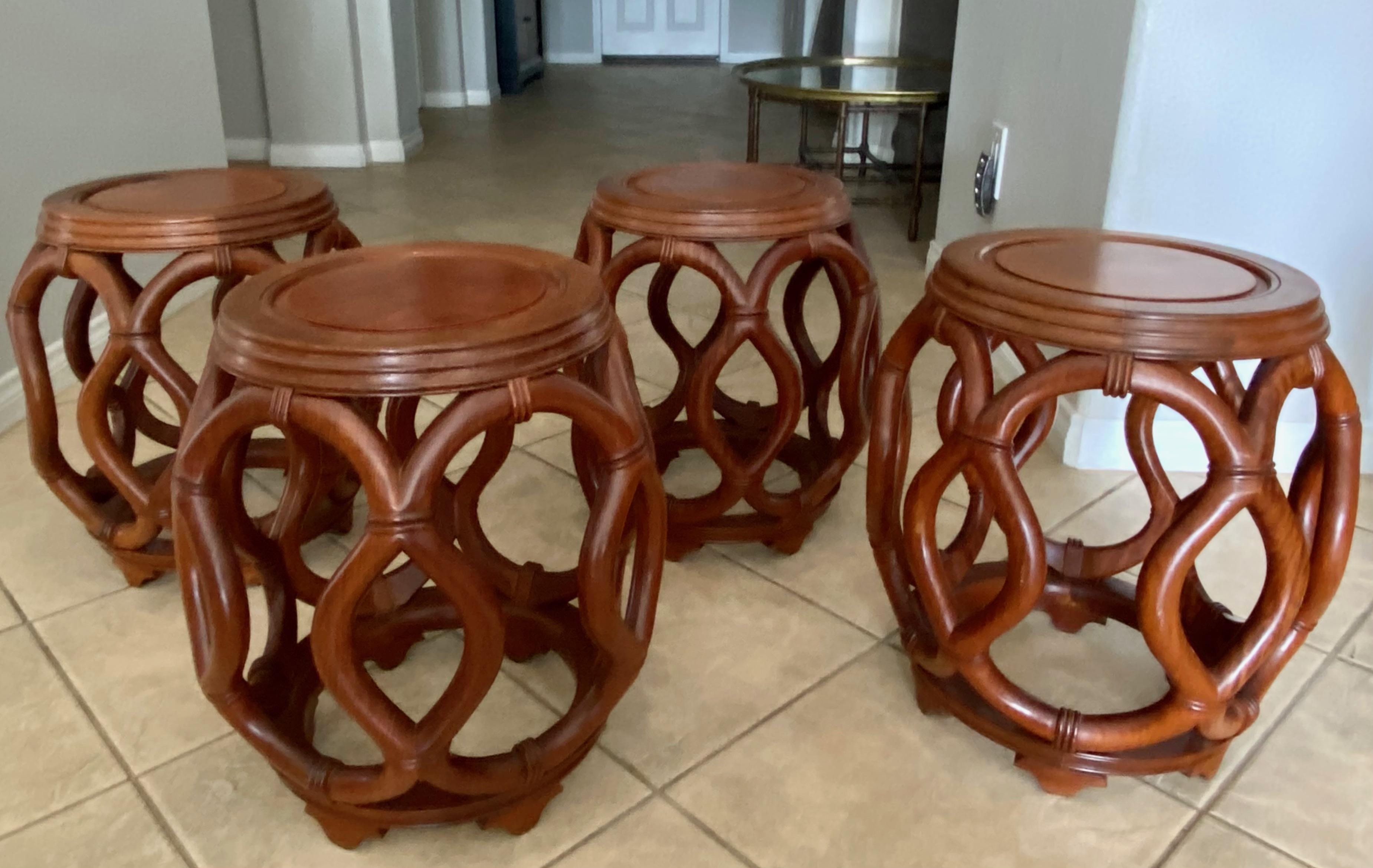 Set of 4 (four) Chinese hardwood barrel form interlaced open work support structure garden stools. Can be used as stools or end tables. (Finding 4 of the same stools is rather rare ... the price $3900 is for all 4 stools.).