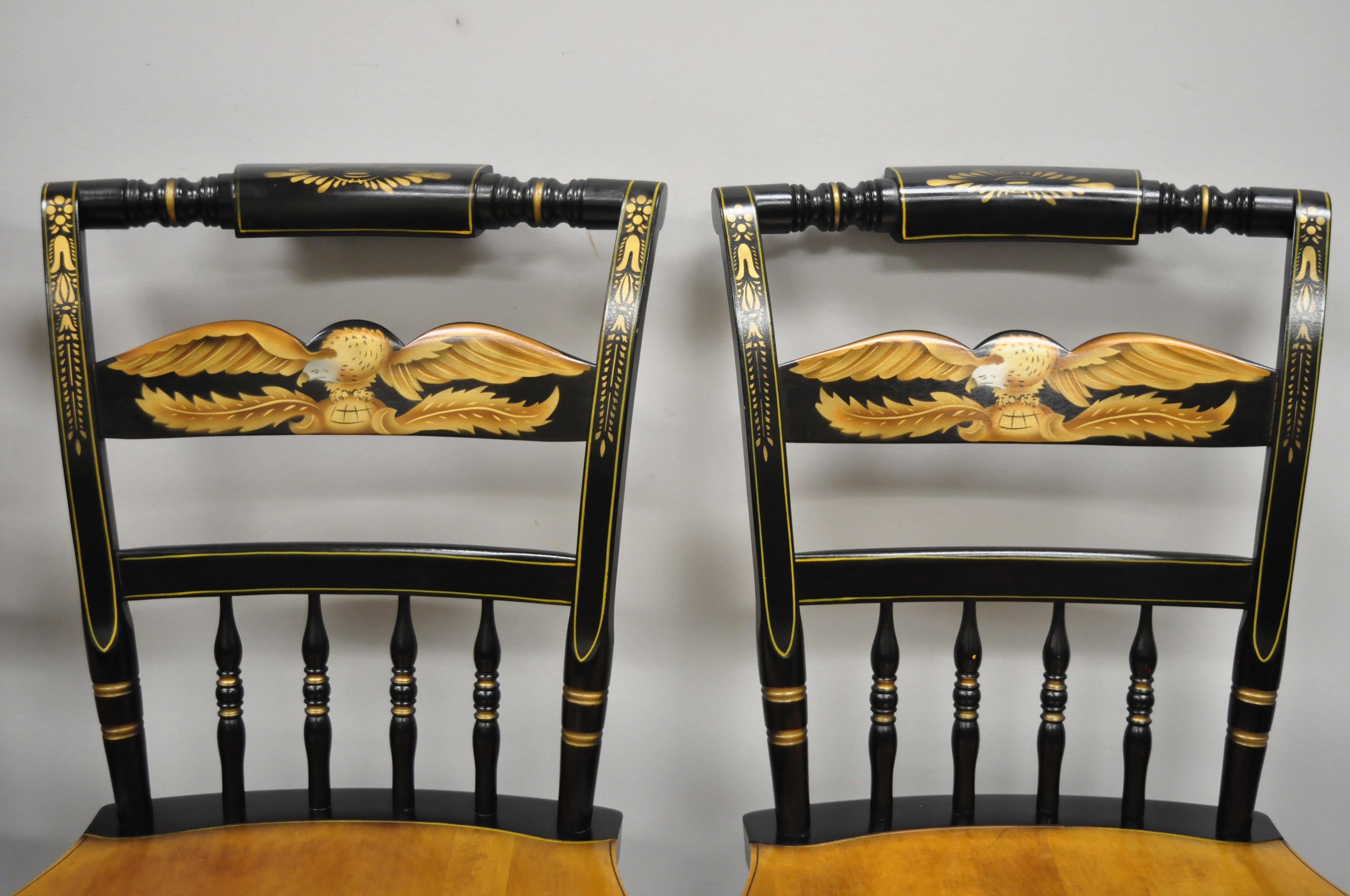 4 vintage L. Hitchcock gold eagle stencils painted black maple dining chairs. Item features (4) side chairs, eagle painted backs, solid wood construction, original signature, quality American craftsmanship, great style and form, mid-20th century.