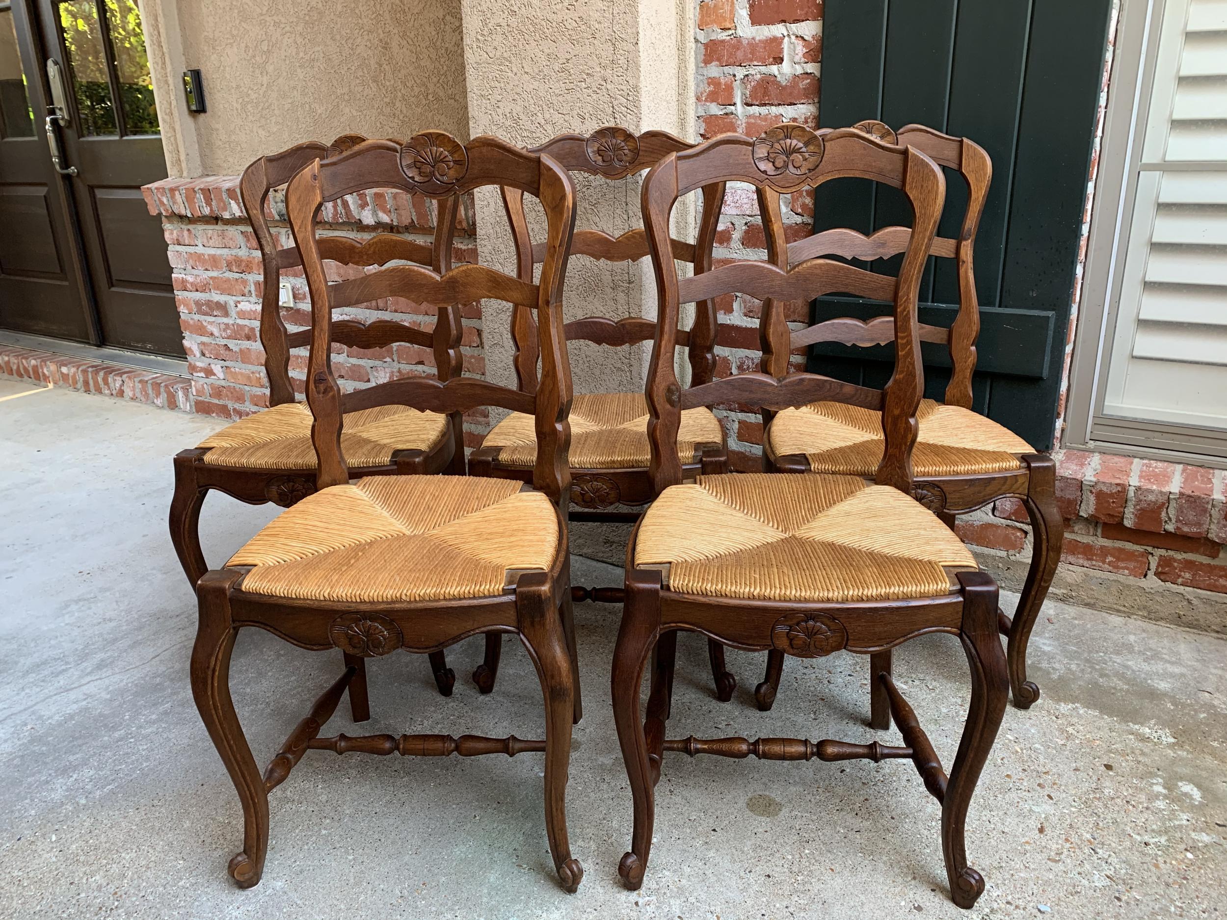 ~Direct from France~
~Lovely set of 5 antique French chairs, with classic French style… perfect for a kitchen or dining room with their original finish that compliments any decor!~
~Serpentine ladder backs with a lovely silhouette; rail has a