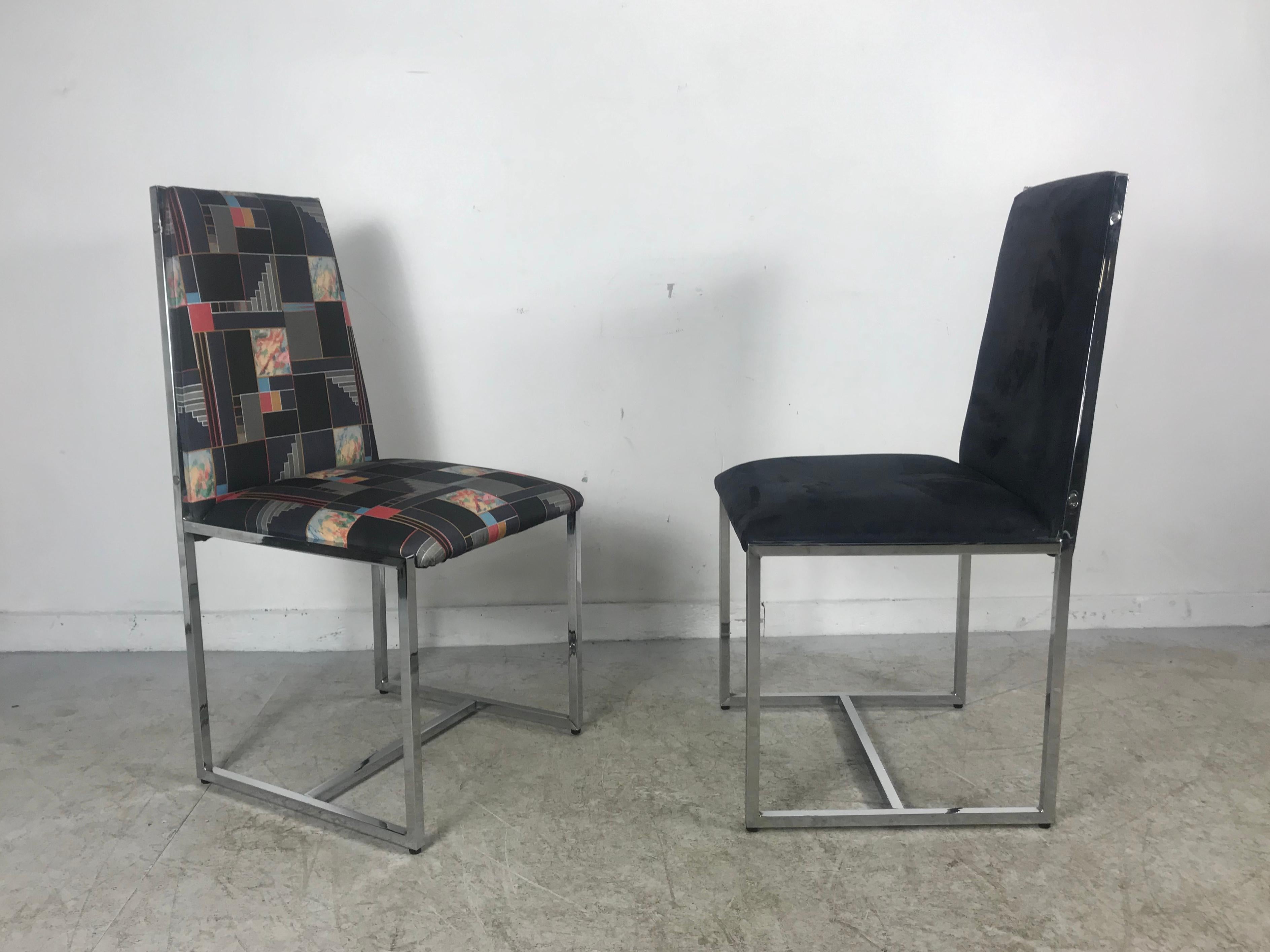 Classic set of six 1970s chrome and suede dining chairs in the style of Milo Baughman. Stunning stylized side chairs, chairs have recently been restored, reupholstered, four with quality black suede, two with high end geometric fabric. Extremely