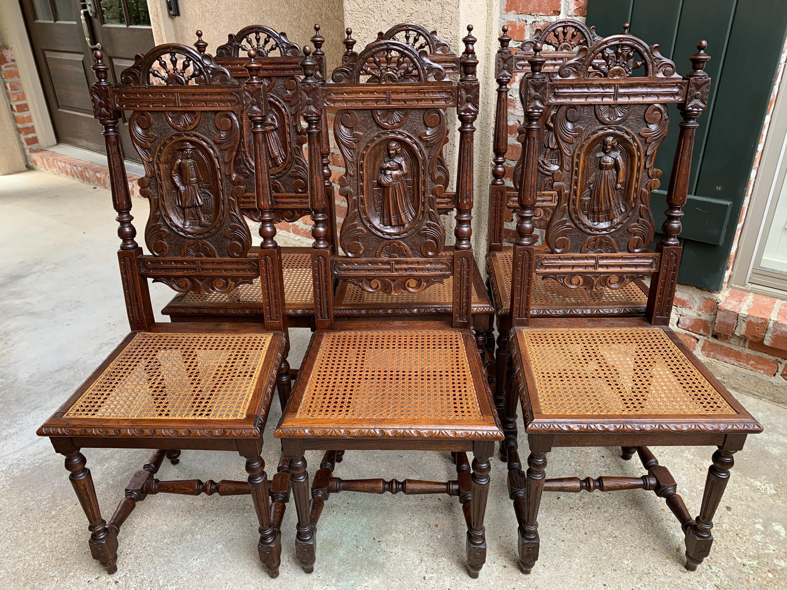 ~Direct from France~
~Lovely set of 6 antique French carved oak dining chairs~
~Ornate carved design on the crest with the ubiquitous Breton “ships wheel” trim on the rail~
~The highlight are the carved figural characters on each chair, three are