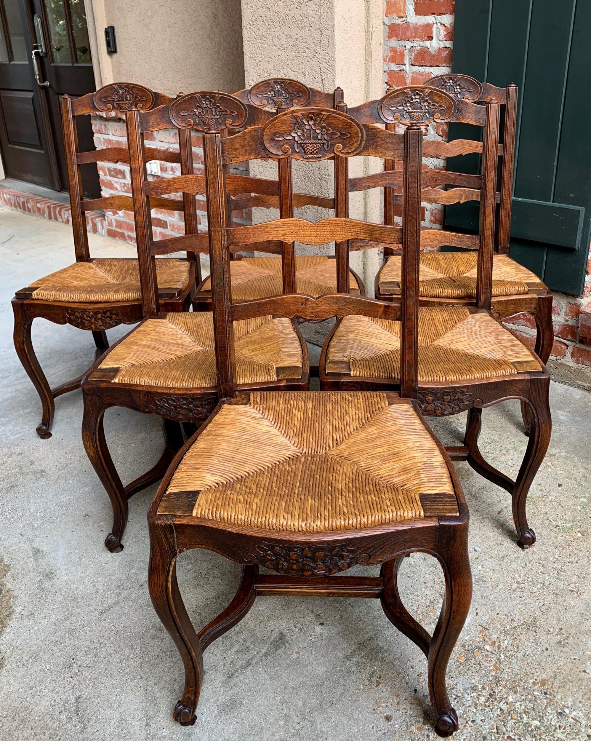 ~ Direct from France
~ Lovely set of 6 antique French chairs, with Classic French style, perfect for a kitchen or dining room with their original finish that compliments any decor!~
~ Serpentine ladder backs with a lovely silhouette; rail has a