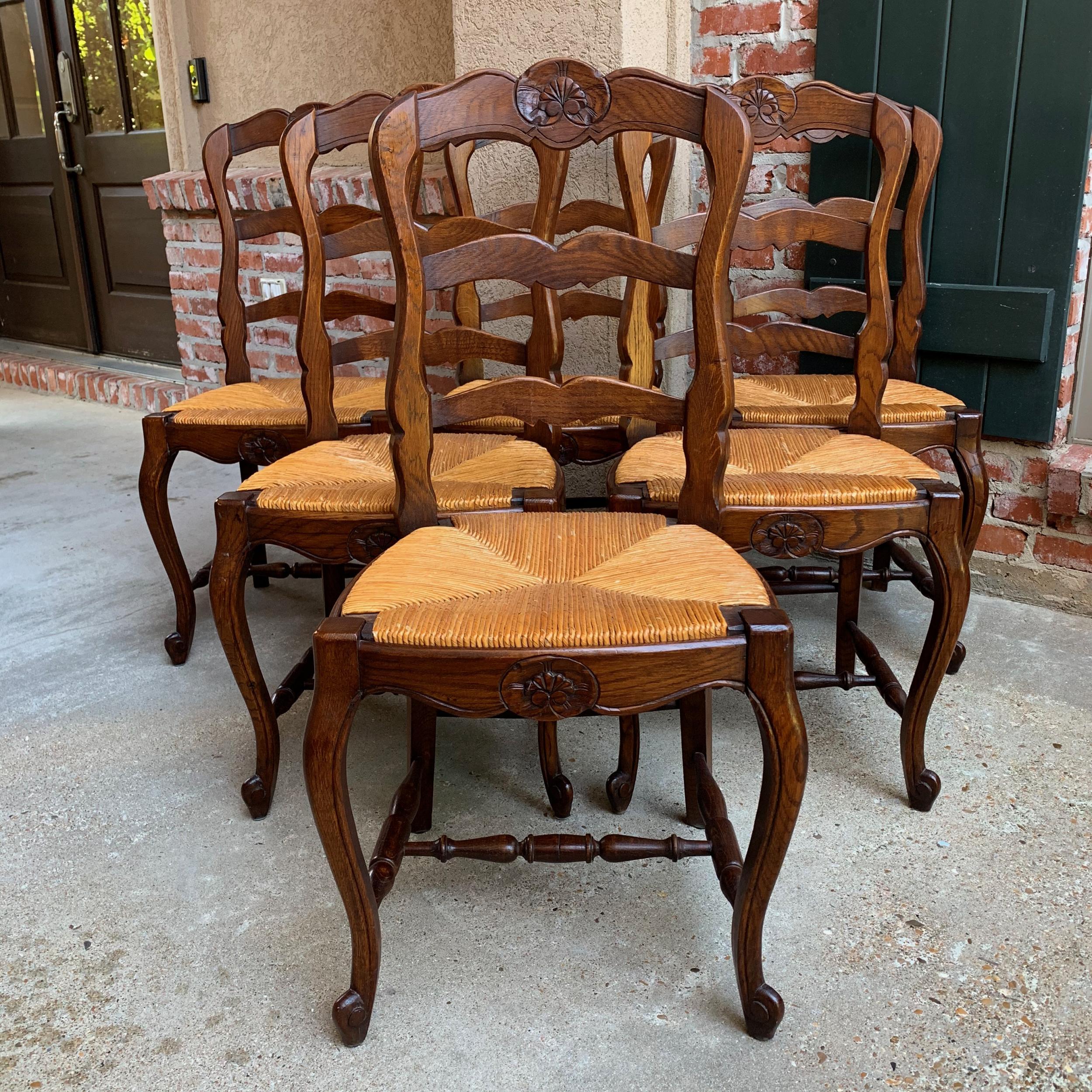 ~Direct from France~
~Lovely set of 6 antique French chairs, with classic French style… perfect for a kitchen or dining room with their original finish that compliments any decor!~
~Serpentine ladder backs with a lovely silhouette; rail has a