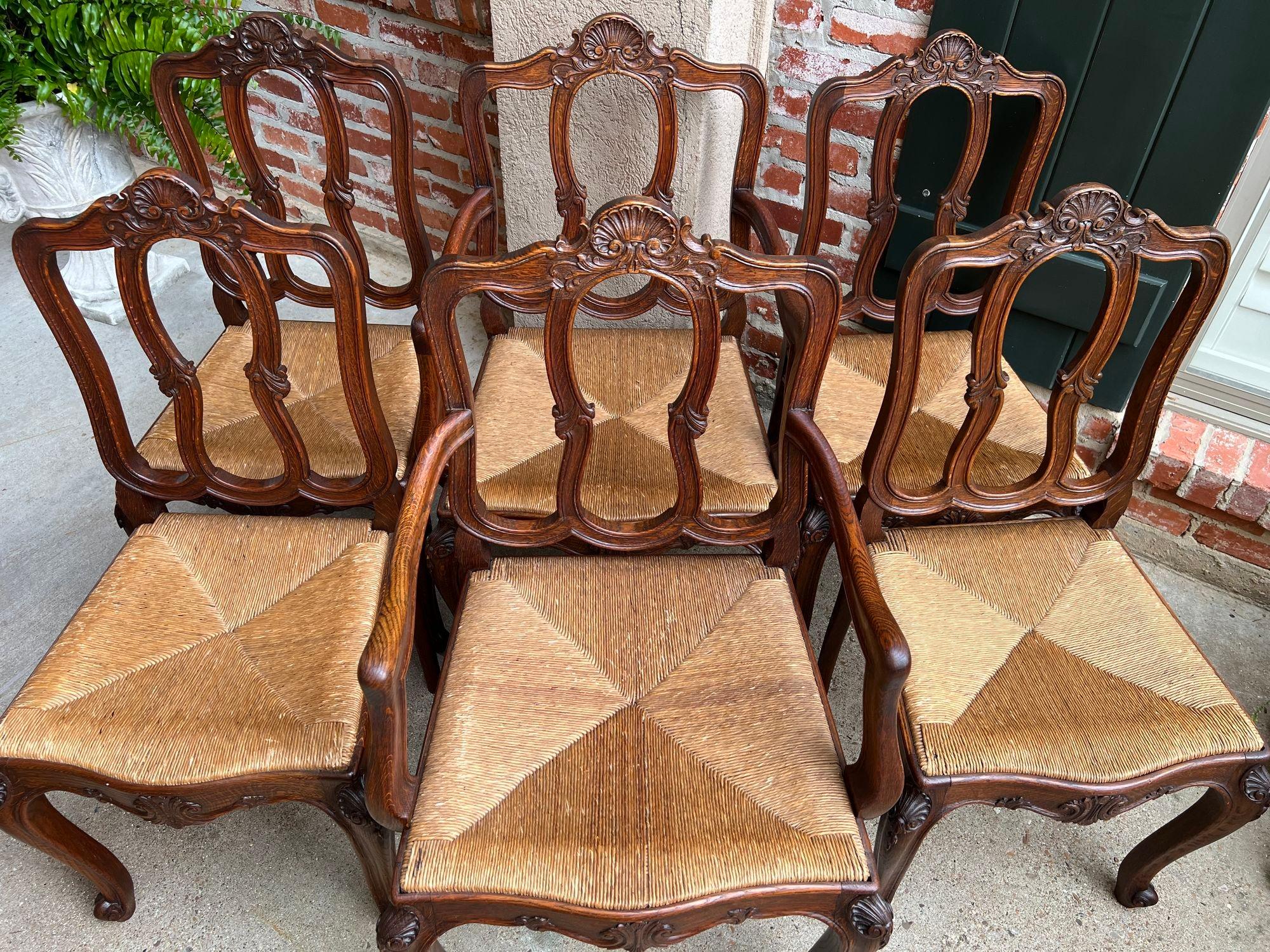 Set 6 Antique French Dining Chairs Carved Oak Rush Seat Louis XV Arm and Side In Good Condition For Sale In Shreveport, LA