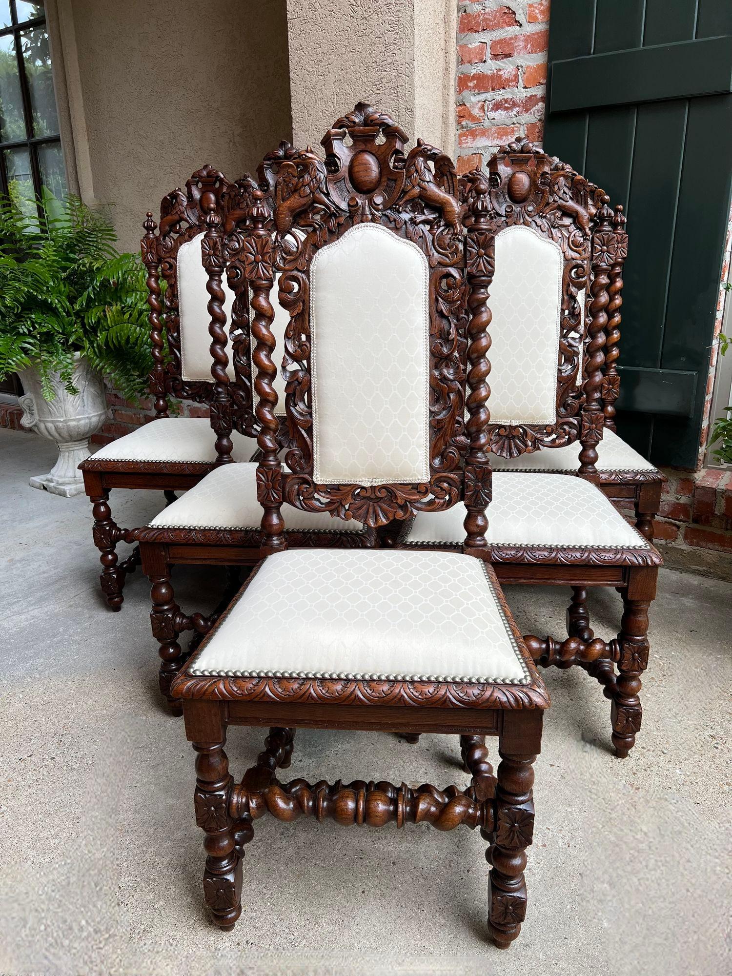 Set 6 Antique French Dining Chairs Renaissance Carved Oak Lion Barley Twist.

Direct from France, a gorgeous set of 6 antique chairs, heavily carved in Renaissance/Baroque style. Stunning for a formal dining or French kitchen and with their abundant
