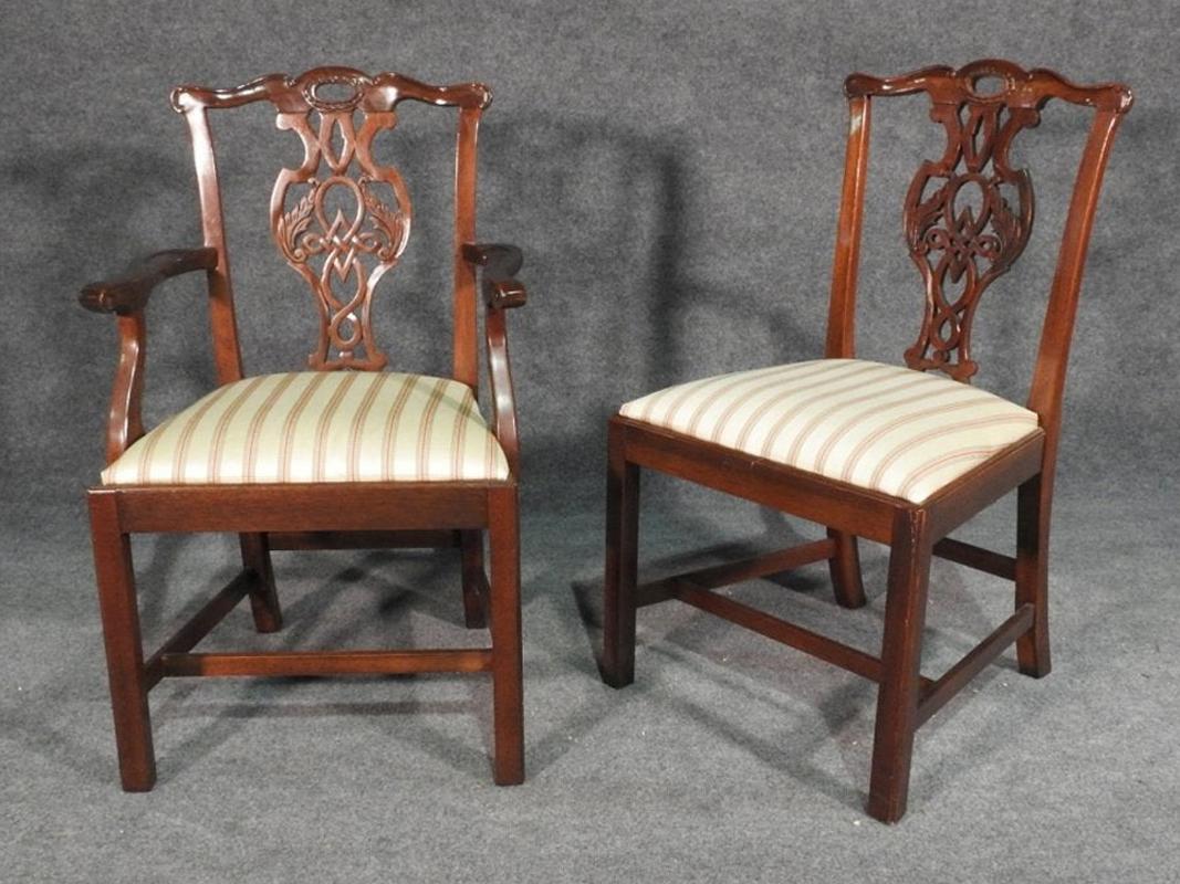 This is a beautiful set of 6 Baker dining chairs in a classic historic design and with the sophistication of Charleston without the more elaborate fussiness of the New England style Chippendale chairs. The chairs are in good original condition and