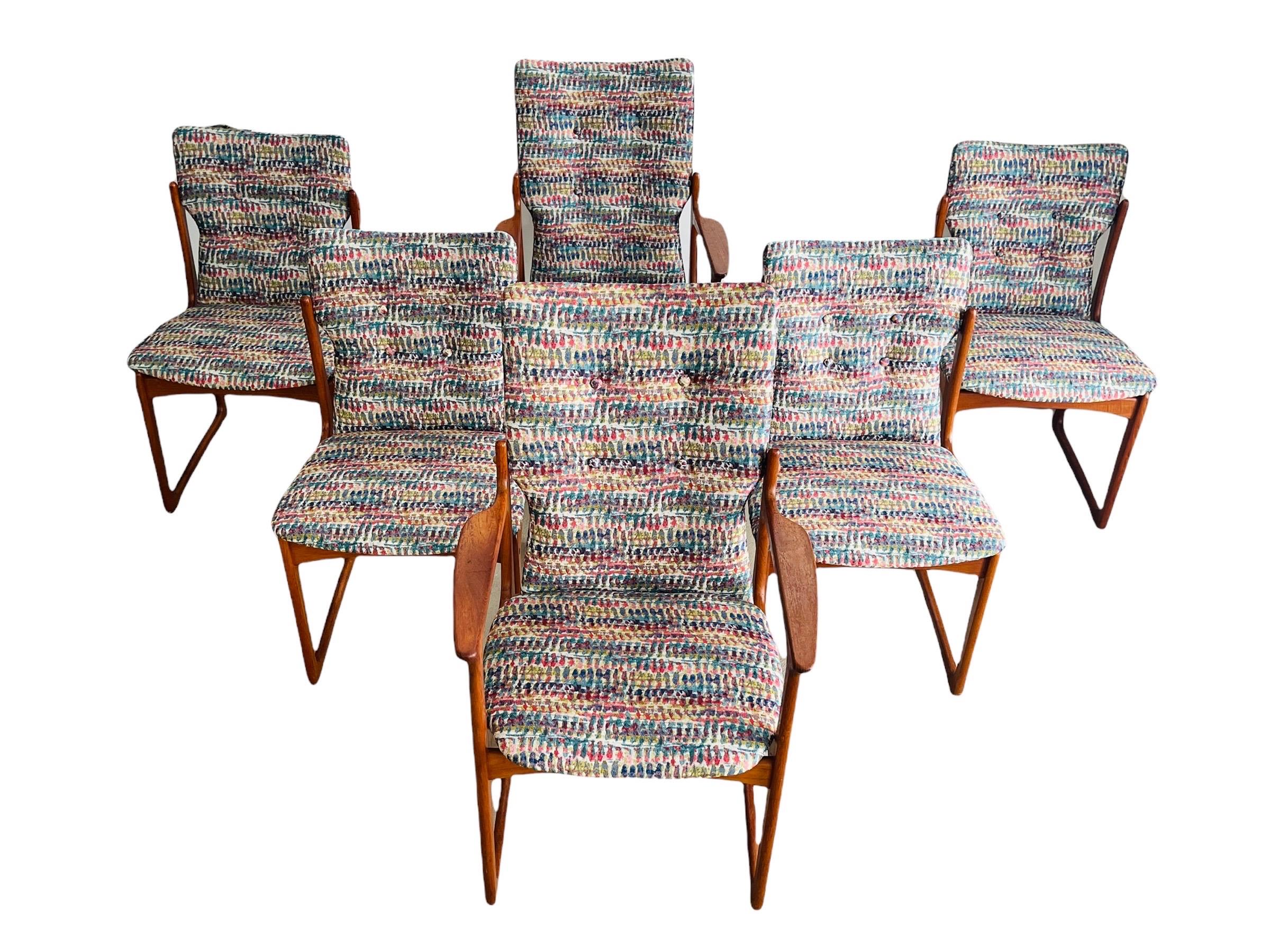 Stunning set of Danish modern teak dining chairs by Vamdrup Stolefabrik. These chairs are very unique and comfortable too! The chairs have a beautiful sculpted teak frames with a backrest that’s that’s sorta like a cock bottle. The chairs have been