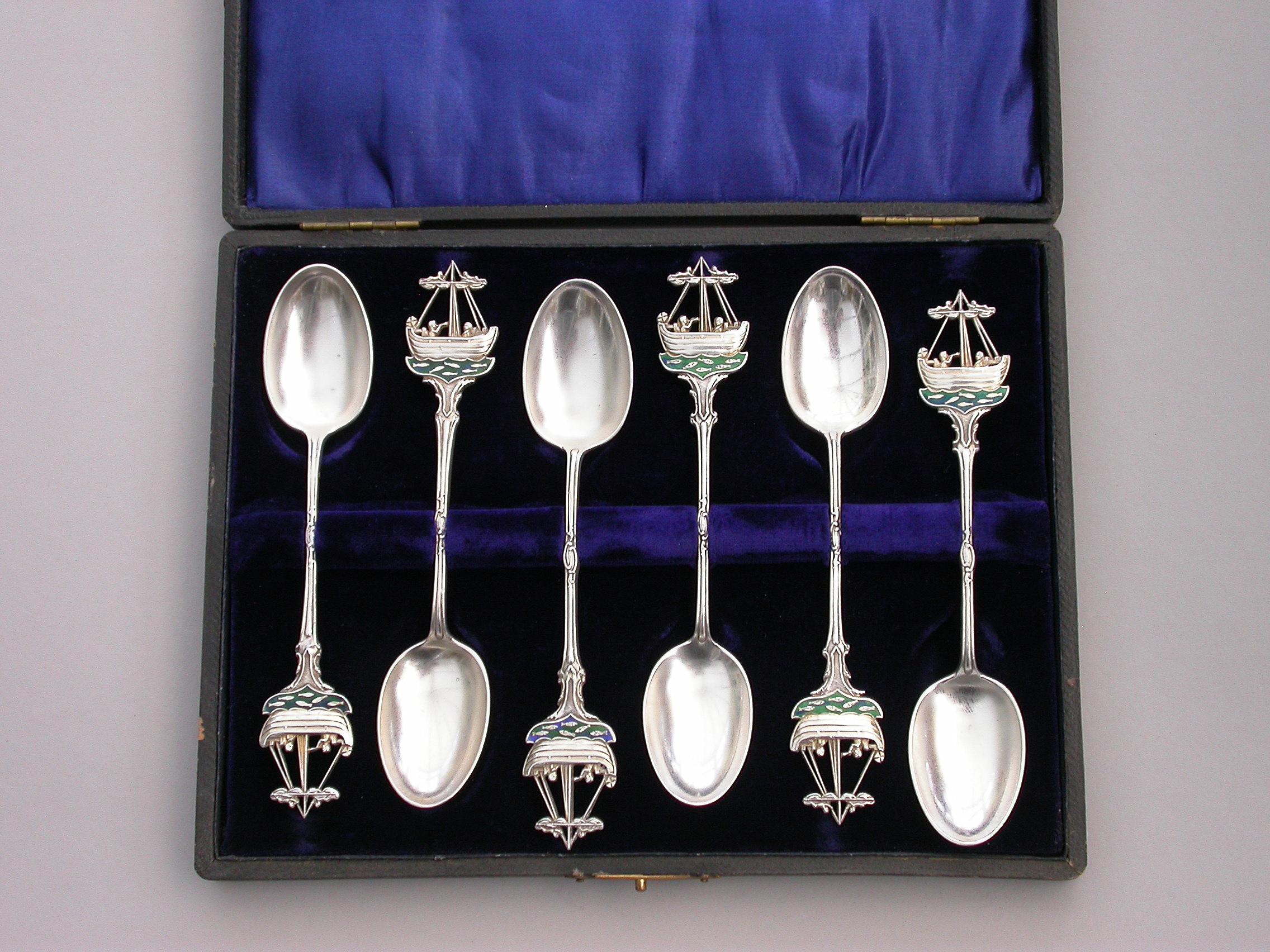 An interesting composed set of six early 20th century silver and enamel Golfing Prize Teaspoons from the Hythe Golf Club in Kent which was founded in 1894. The terminals formed as the clubs emblem depicting a boat on a blue and green enamel sea