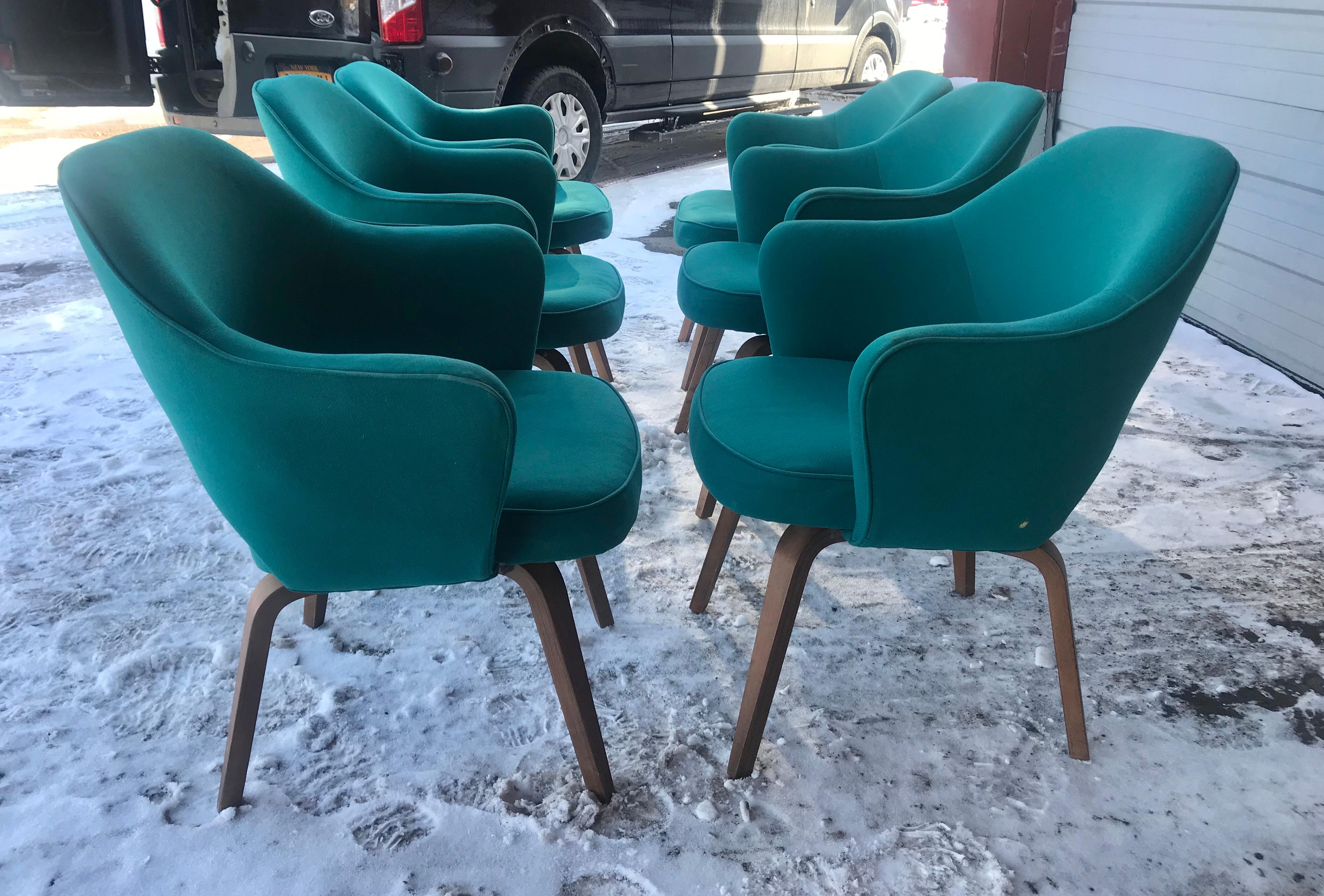 Nice early production set of 6 executive armchairs designed by Eero Saarinen manufactured by Knoll, I believe this set dates to late 1960s-early 1970s, retains original teal blue/green wool fabric and Classic bent walnut legs, Classic midcentury