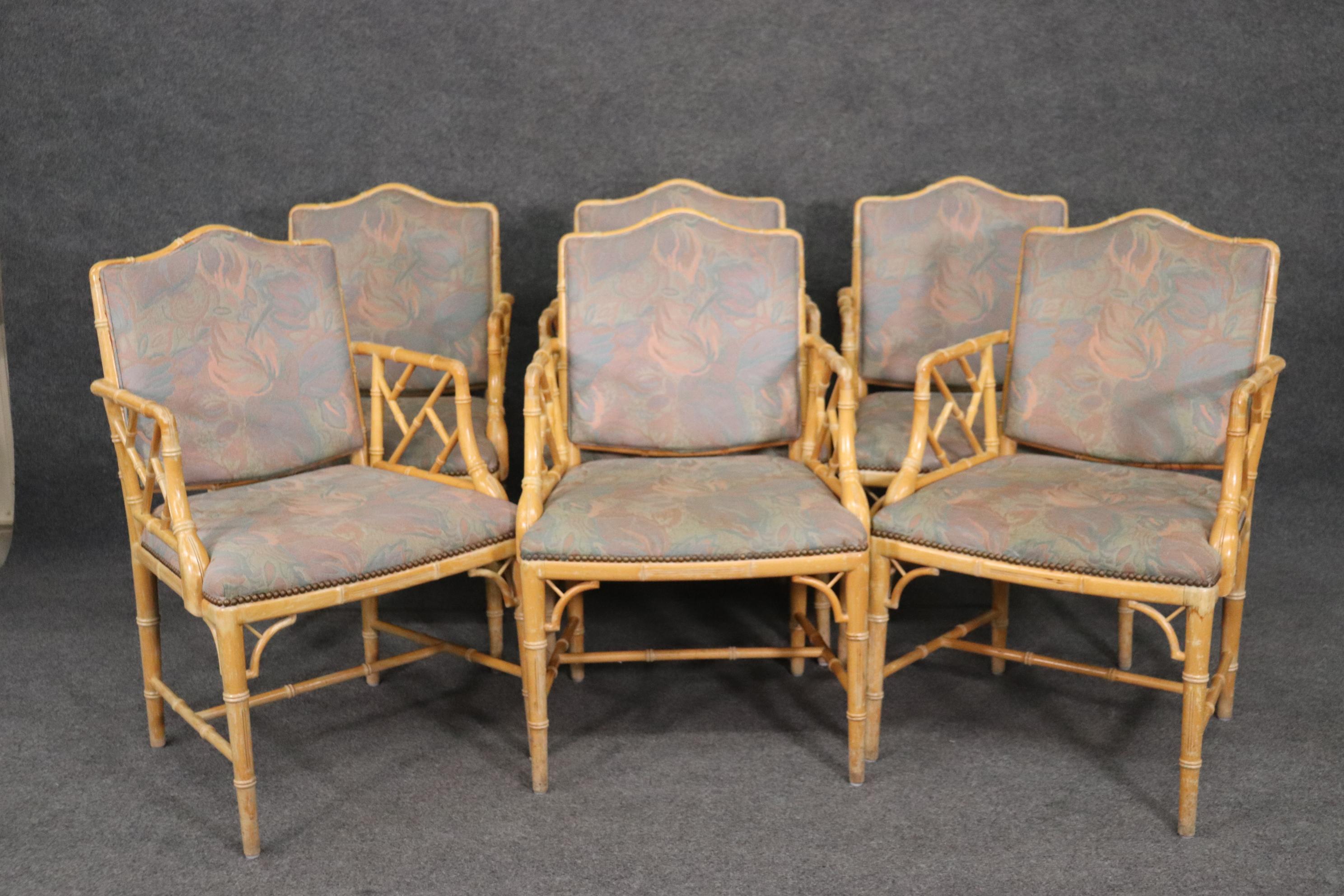This is a beautiful set of Hollywood Regency chairs. The chairs are done in faux bamboo and may need reupholstery. However the frames are gorgeous. The chairs each measure 23 wide x 22 deep x 36 tall with an 18 inch seat height.